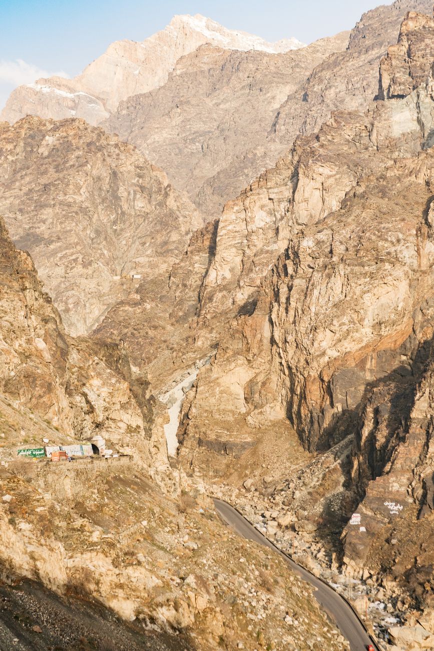 Rugged, barren mountain ridges and steep switchbacks winding through remote highlands of central Afghanistan