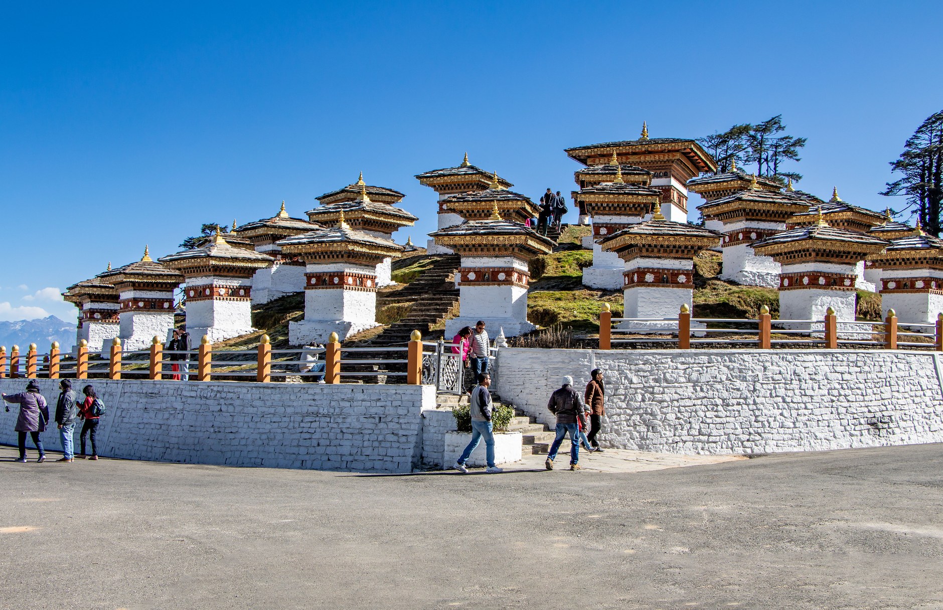 The 108 Druk Wangyal Chortens memorial stupas crowning the crest of Dochula Pass at 3,100 meters elevation
