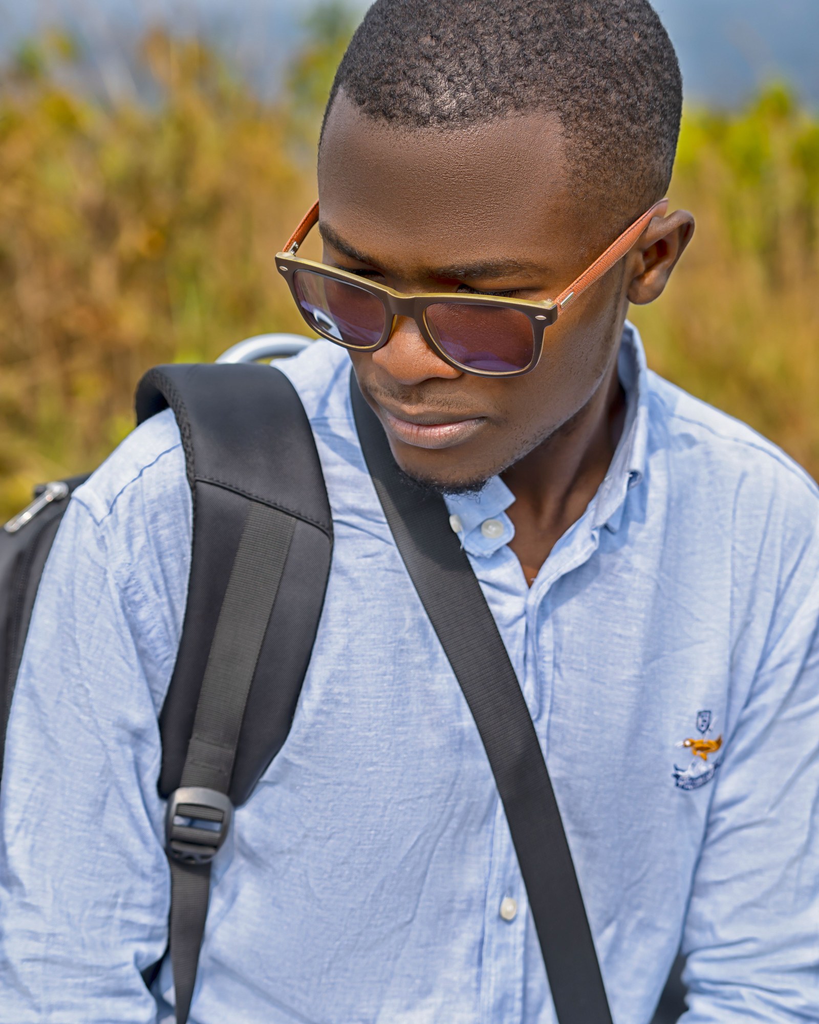 Fashionable man in Brazzaville wearing tailored designer suit representing modern Congolese La Sape elegance