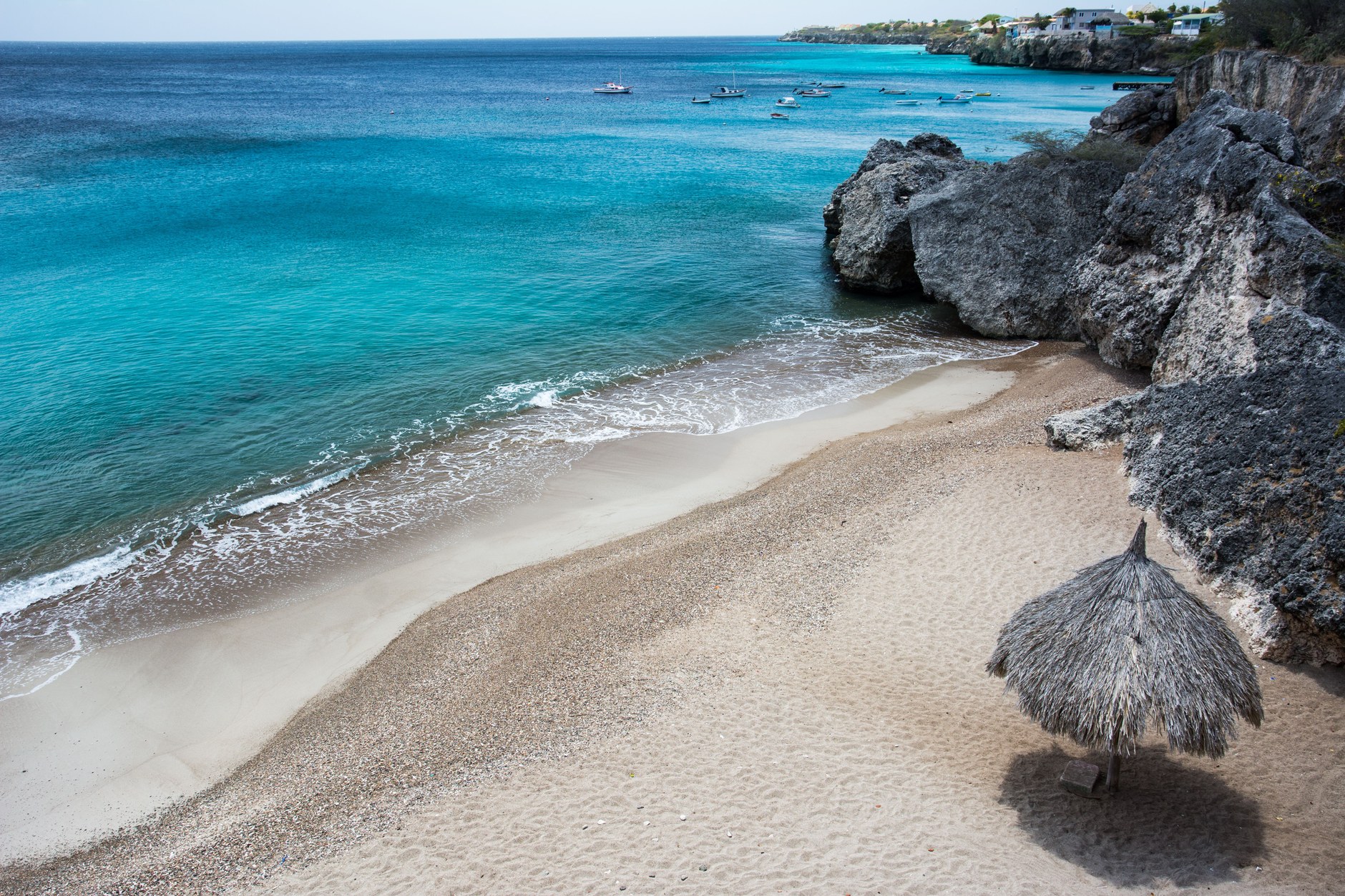 The luminous turquoise waters and white sands of Grote Knip beach