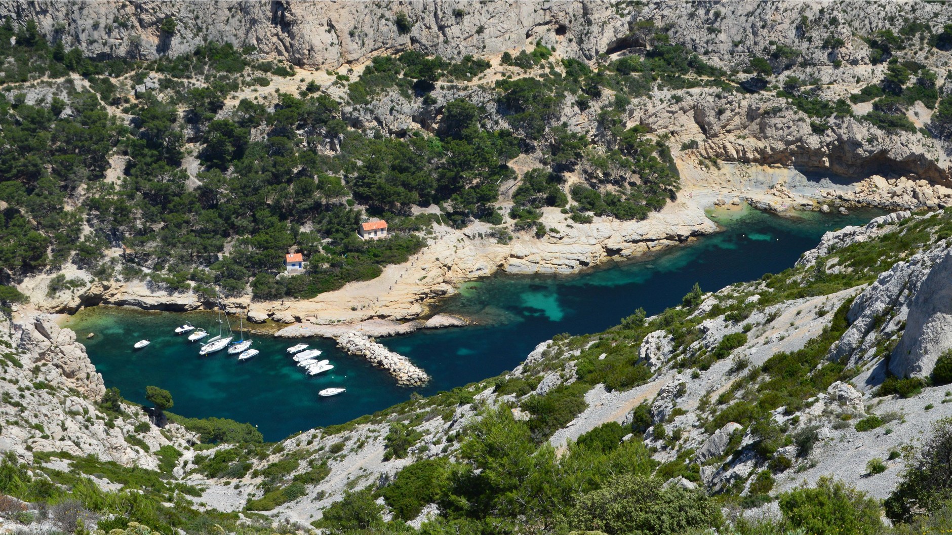 Playa Lagun's secluded limestone channel sheltered by rocky headlands