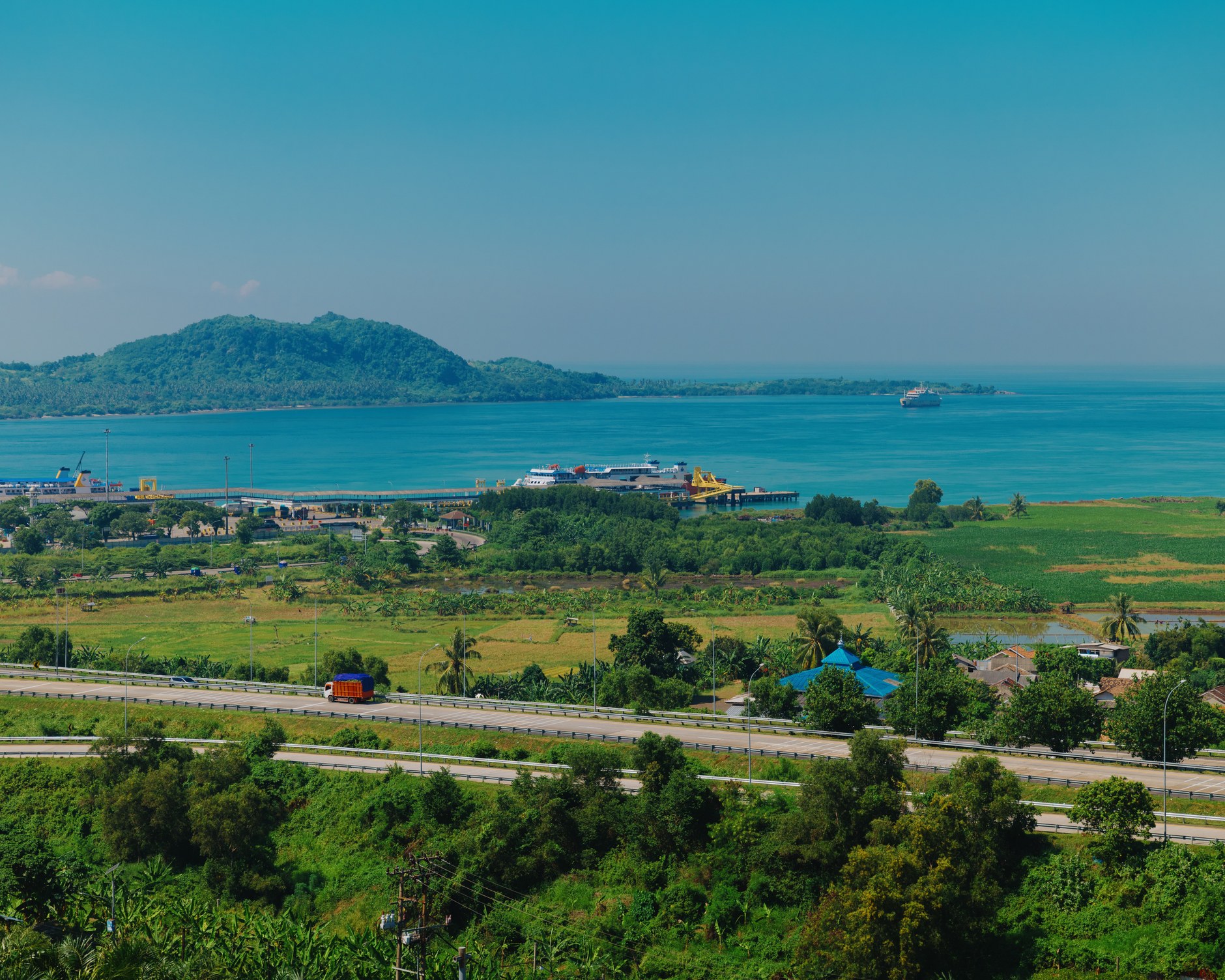 Rolling volcanic ridges and coastal valleys overlooking Cetti Bay in southern Guam