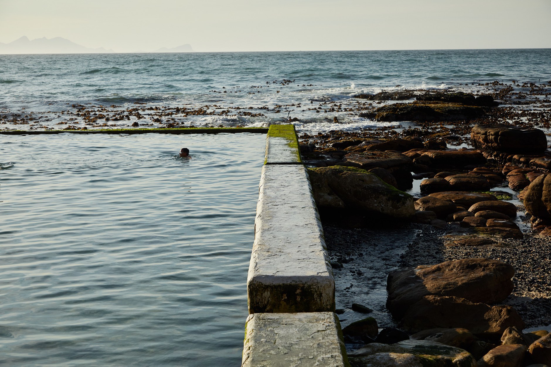 Natural saltwater swimming pools carved from coral rock in Inarajan
