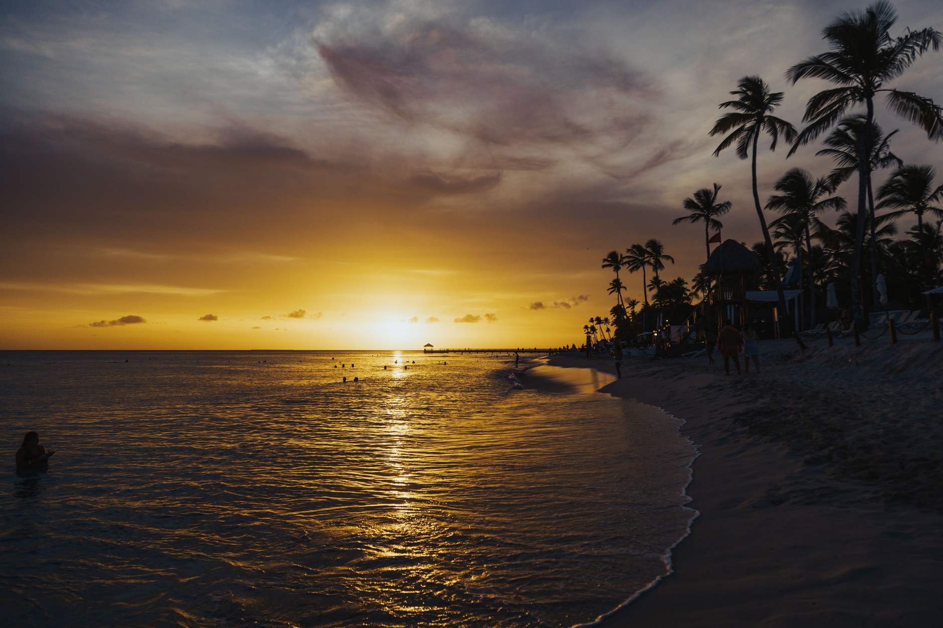 Golden twilight over the calm waters of the Tumon Bay barrier reef