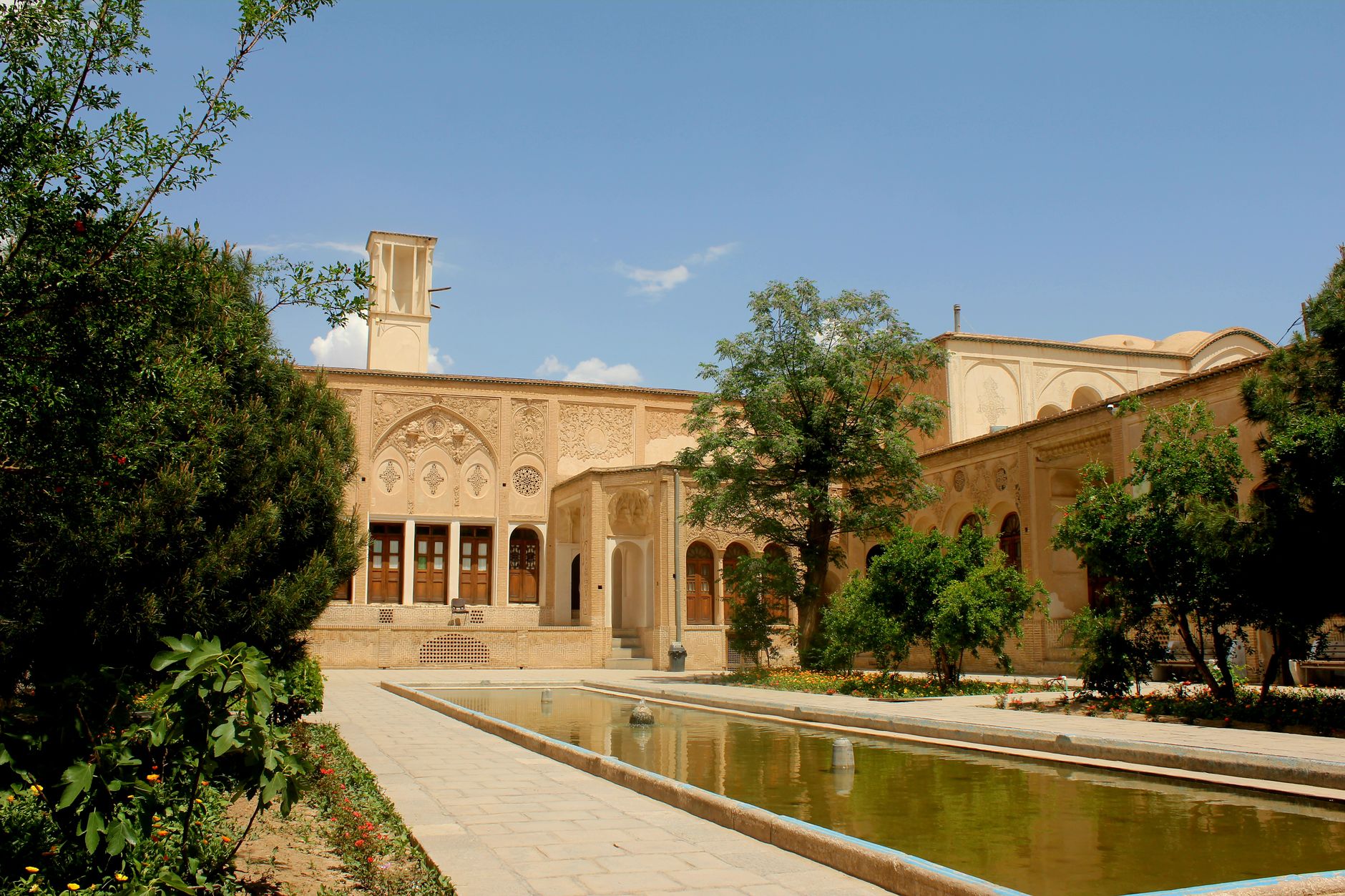 Ornate traditional courtyard and stucco relief facade of the historic Borujerdi House in Kashan