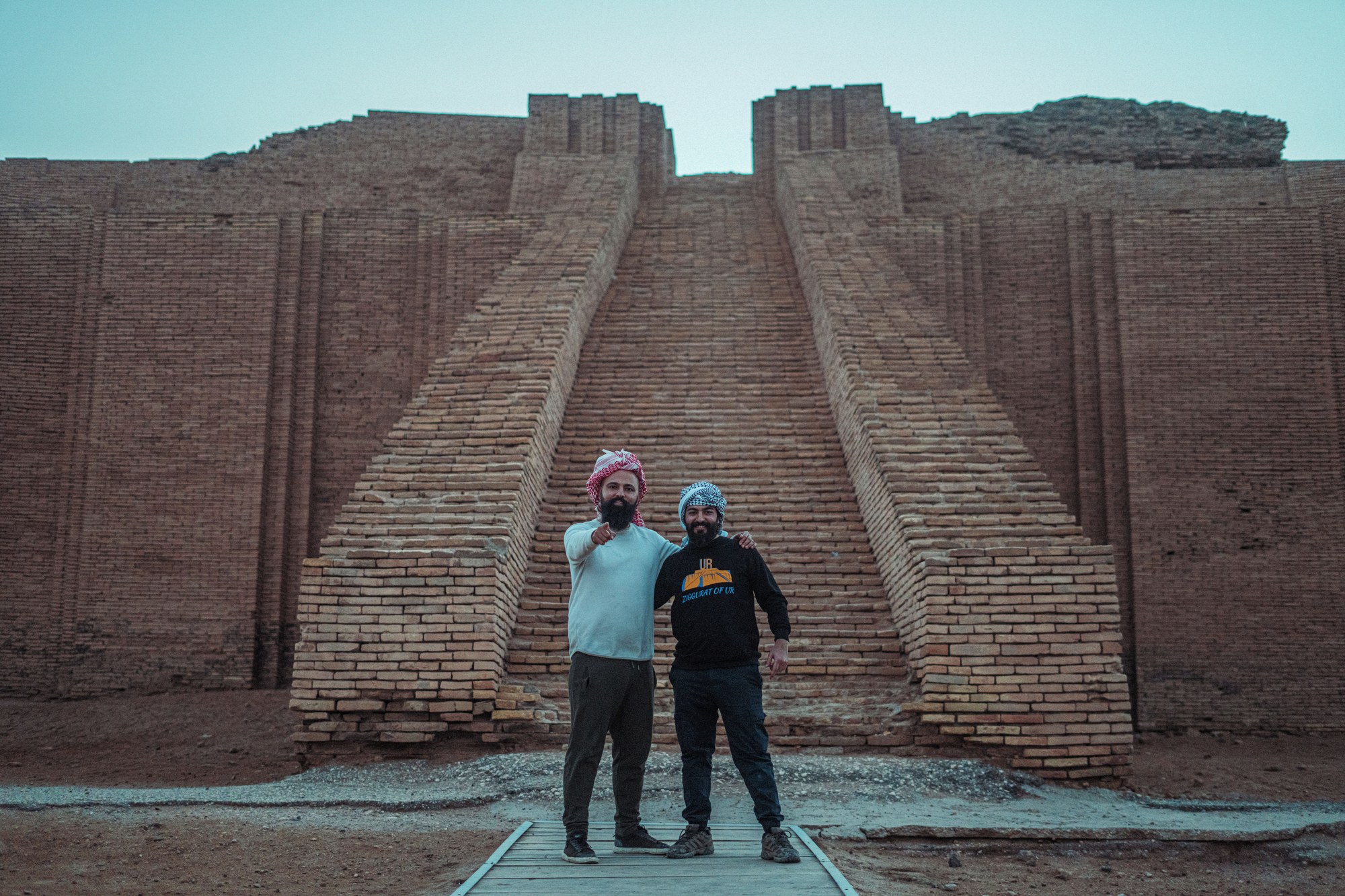 Tourists admiring the ancient baked-brick construction of the Great Ziggurat of Ur in Dhi Qar Governorate
