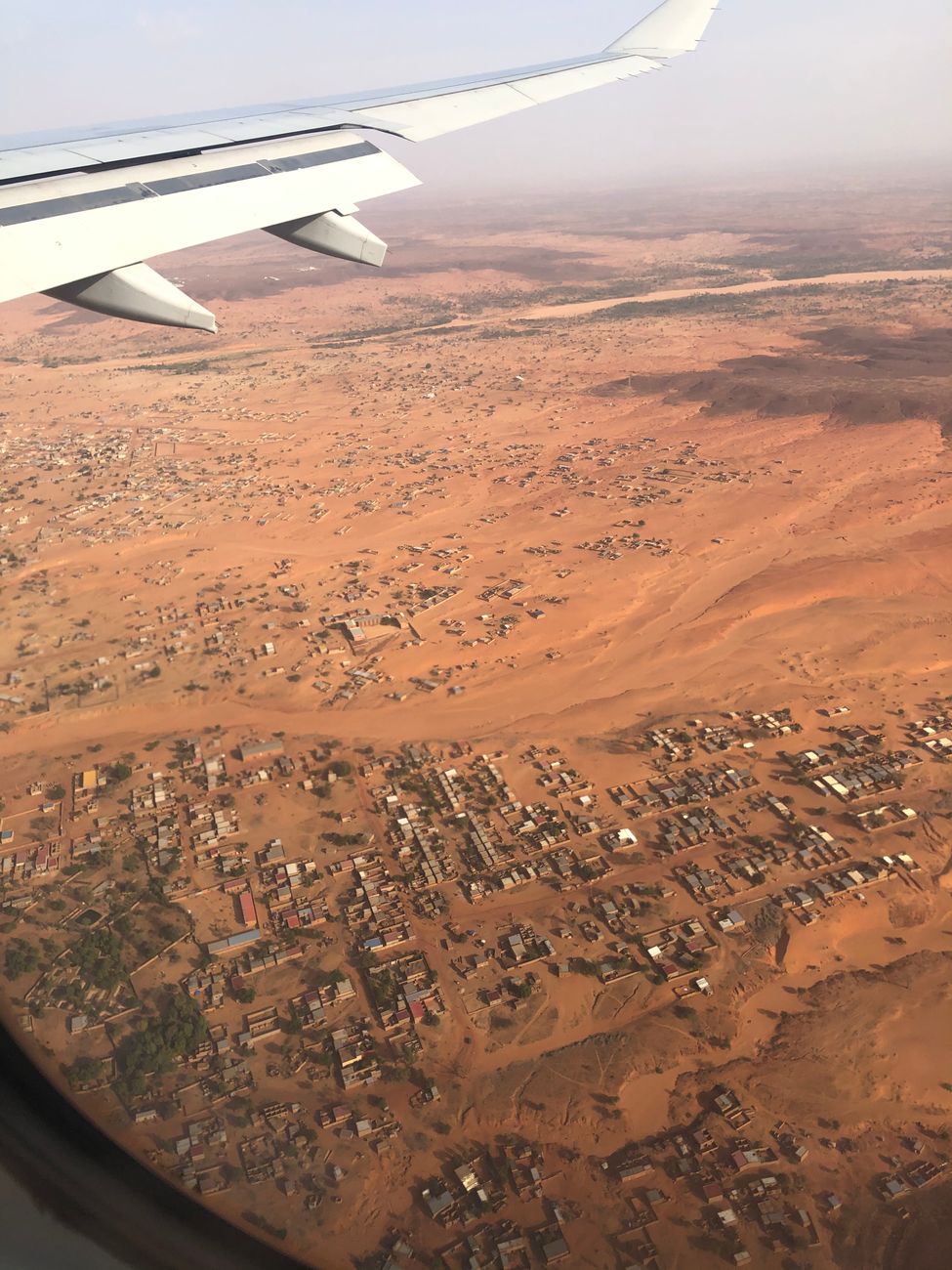 Aerial view of Niamey, Niger with urban neighborhoods bordering the Sahel desert