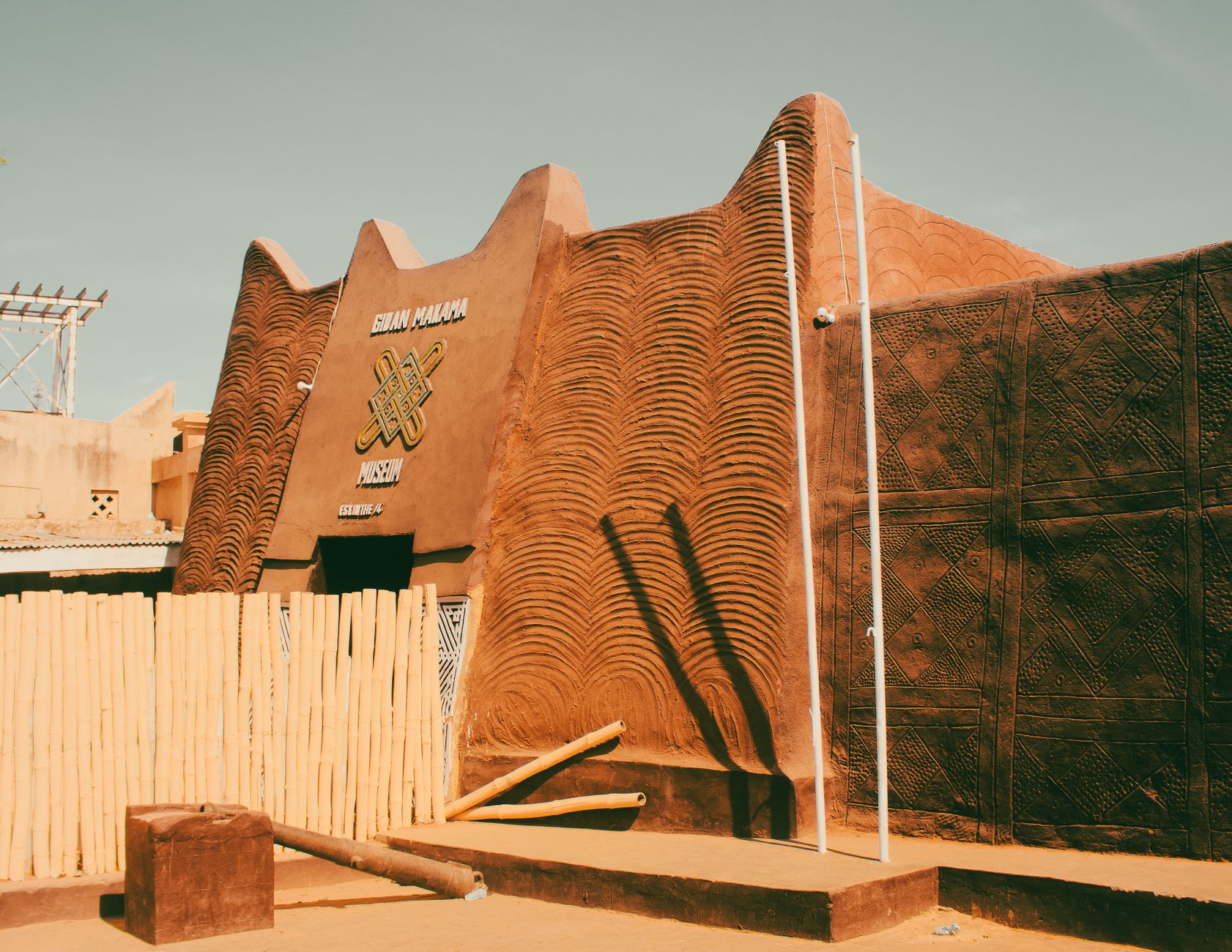 Traditional Sudano-Sahelian earthen clay building with decorative architectural relief in Niamey