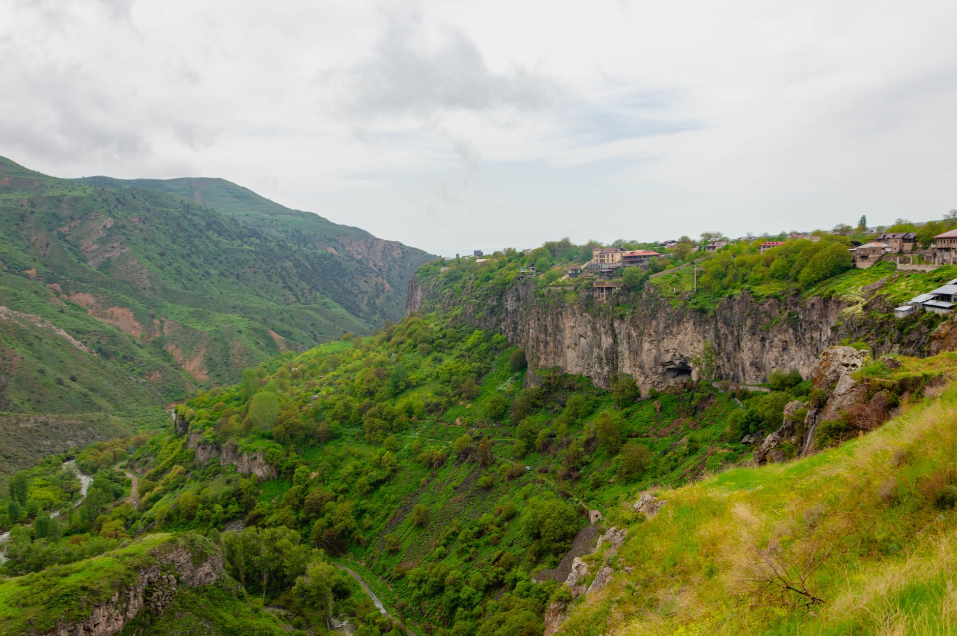 Lush forested green mountain slopes and mist-shrouded valleys of Dilijan National Park in northern Armenia
