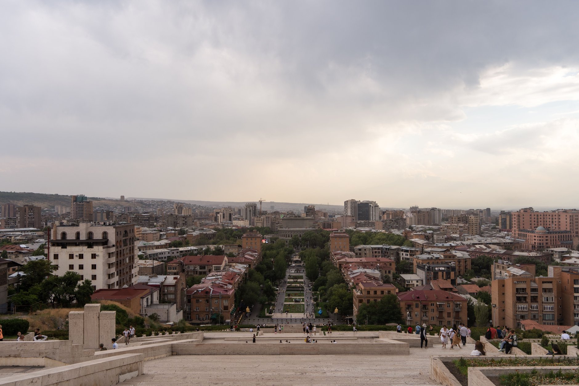 Tiered limestone terraces and fountains of the Cascade complex in central Yerevan with Mount Ararat rising on the distant horizon
