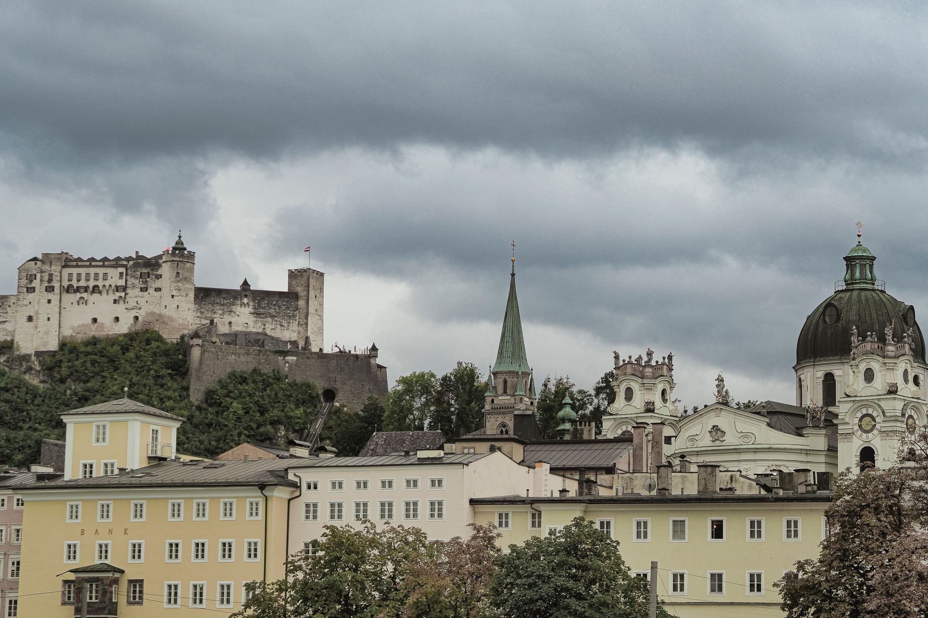 Hohensalzburg Fortress crowns the Festungsberg cliff high above the Salzach River in Salzburg