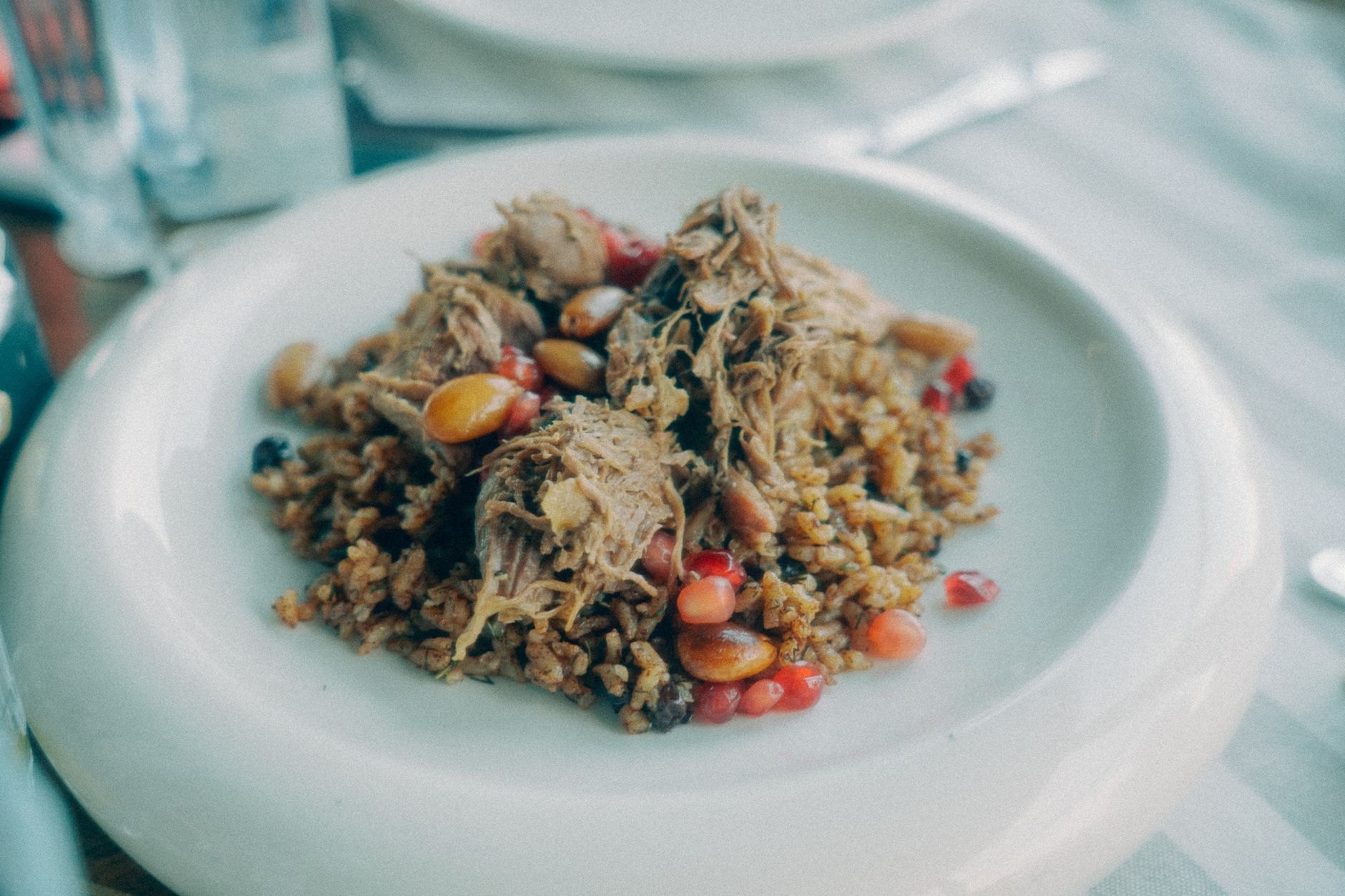 Fragrant golden saffron rice pilaf served with tender lamb, sweet dried apricots, chestnuts, and golden raisins