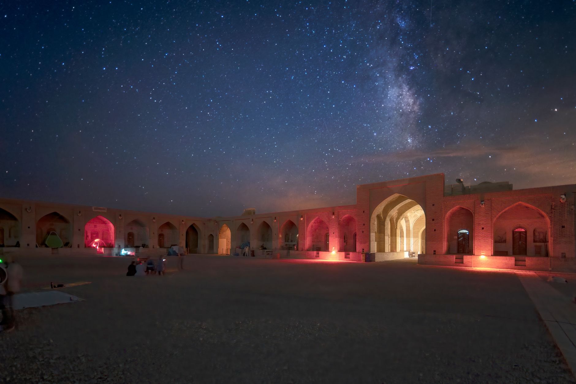 Spacious stone-vaulted courtyard of an authentic eighteenth-century Silk Road caravanserai surrounded by two tiers of guest chambers
