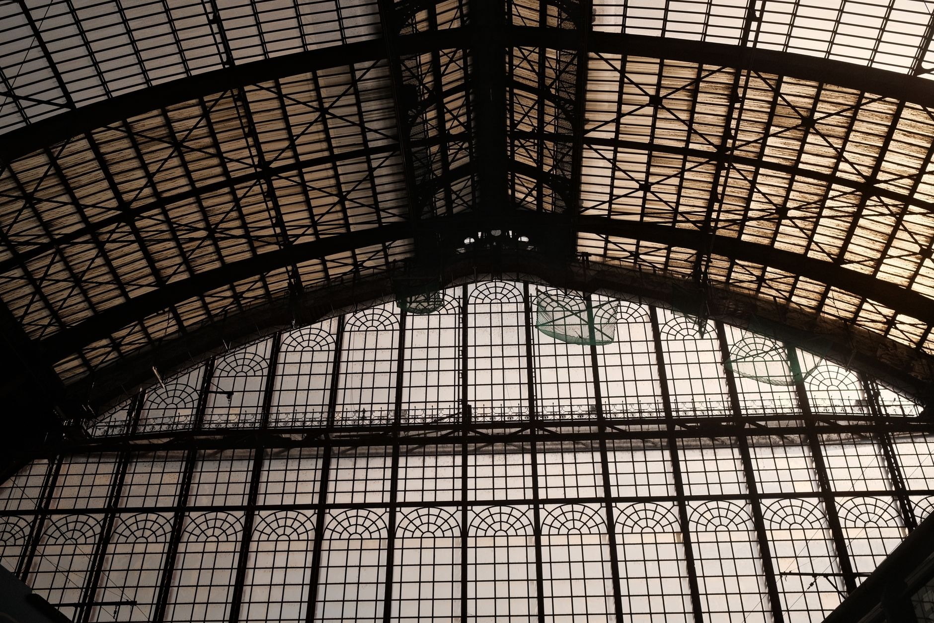Monumental multi-level vaulted iron and stone architecture inside Antwerp Central Railway Station in Belgium