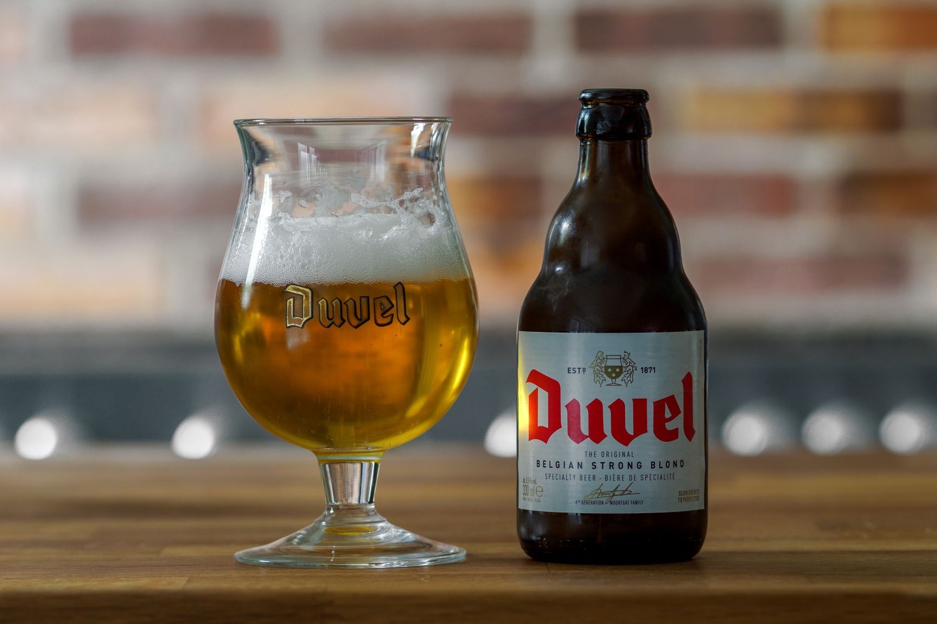 Authentic Belgian abbey ale poured into an elegant stem chalice at a cozy wood-paneled pub in Flanders