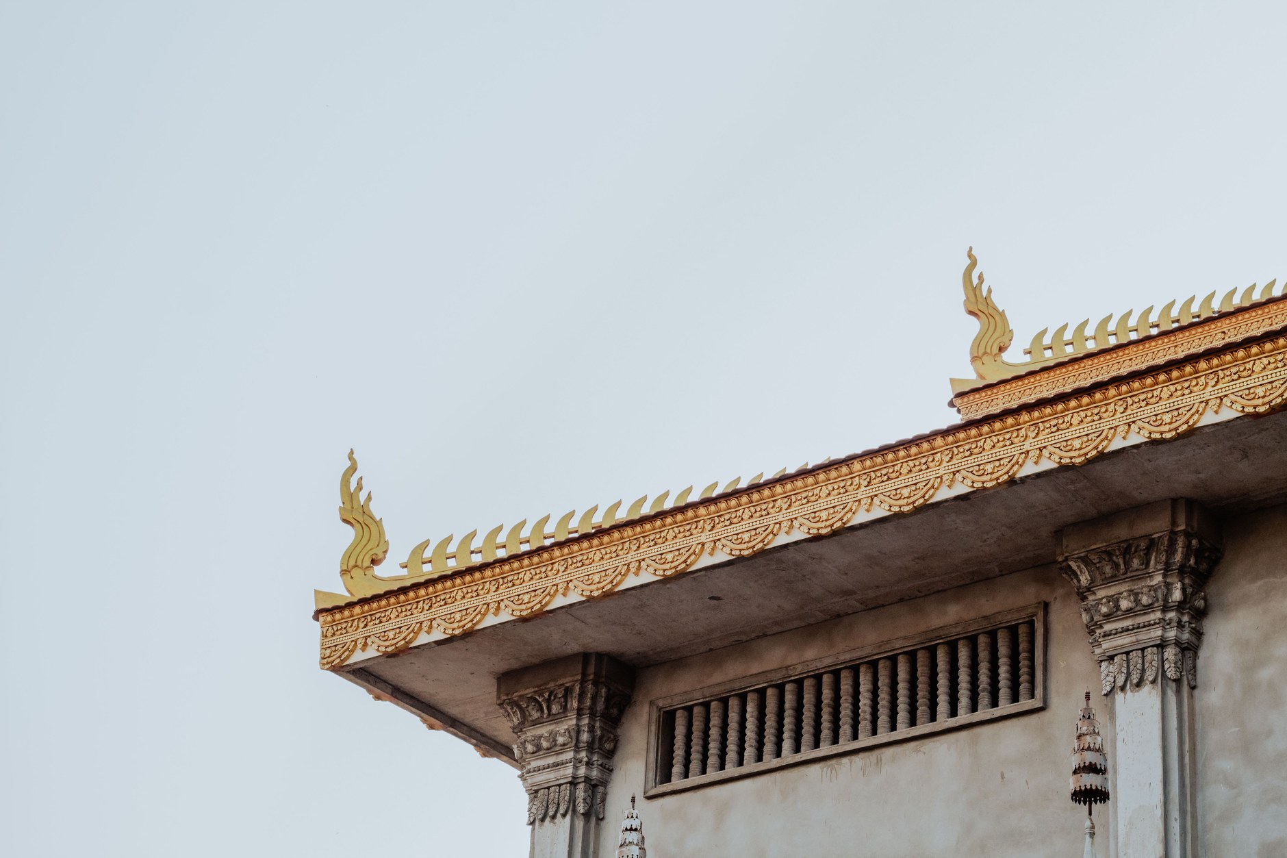 Art Deco yellow dome and bustling vendor stalls of Central Market Phsar Thmey in Phnom Penh