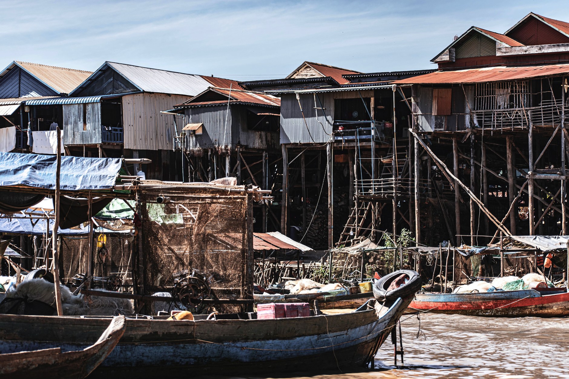 High stilted wooden houses along the waterways of Kompong Phluk on Tonle Sap lake