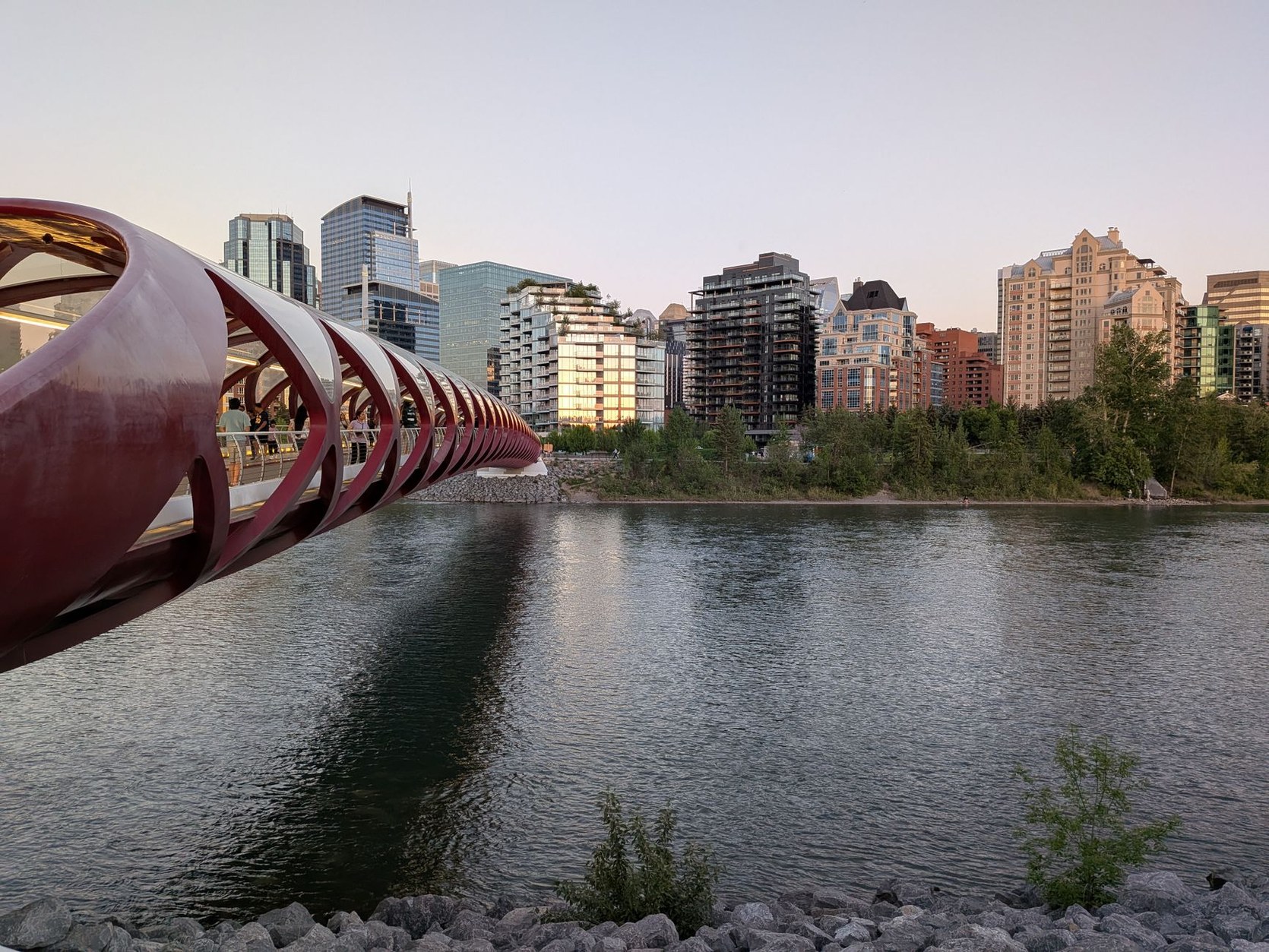 Downtown Calgary modern glass skyline reflecting on the Bow River