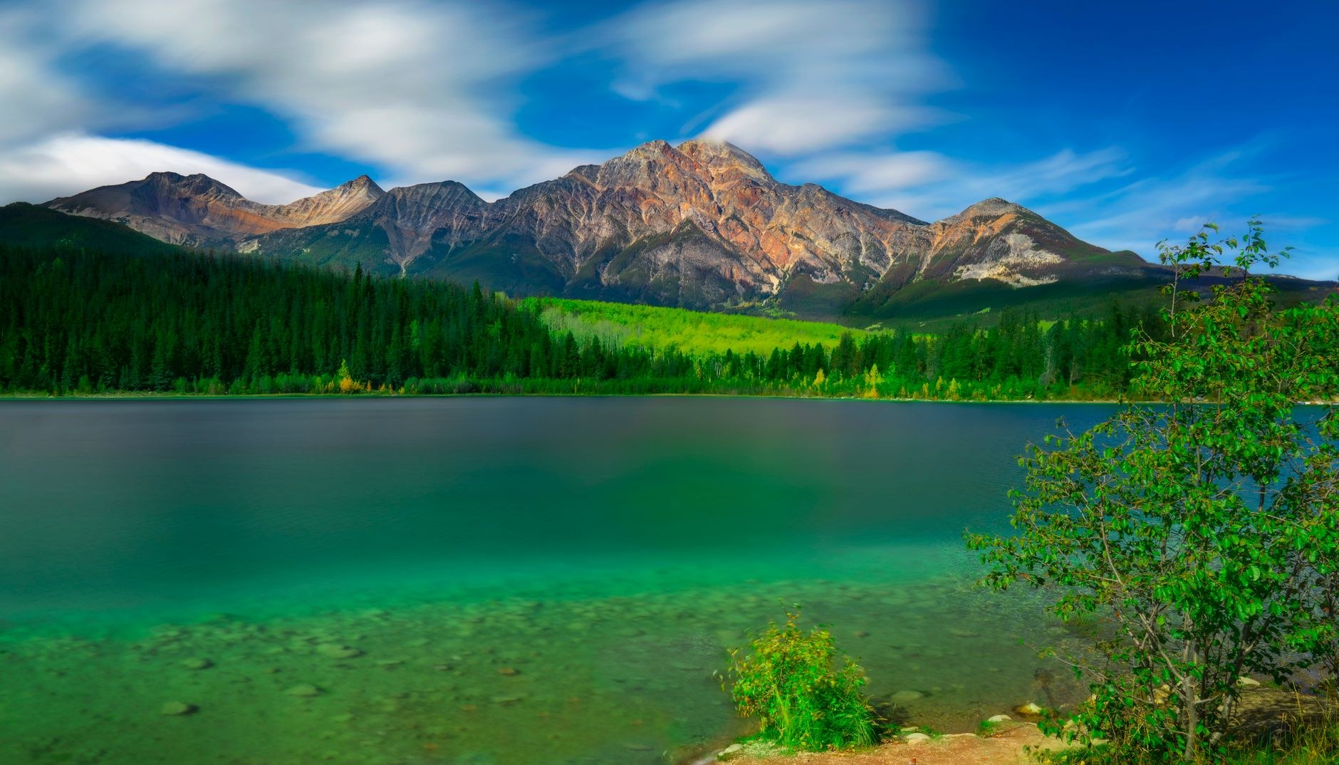 Tranquil mountain lake reflection in Jasper National Park