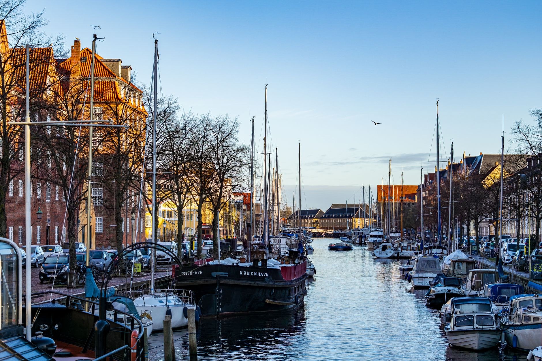 Canal-side residential architecture and traditional Dutch-style waterways in Christianshavn, Copenhagen
