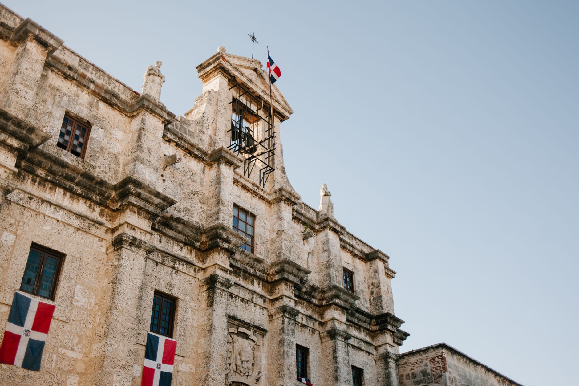 Historic cobblestones and 16th-century Spanish coral-limestone colonial mansions along Calle Las Damas in Santo Domingo