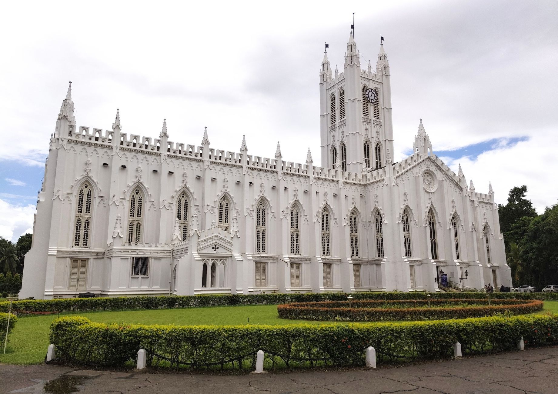 The ornate neo-Gothic facade of Santa Ana Cathedral overlooking the town's palm-fringed central plaza