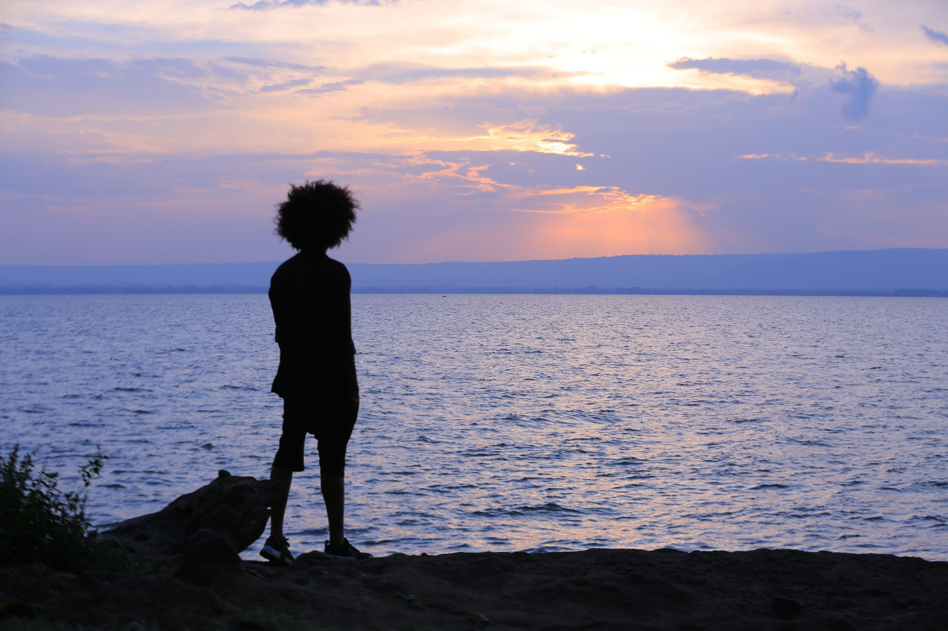 Tranquil sunset scene along the reed-lined shores of freshwater Lake Hawassa in the southern Great Rift Valley