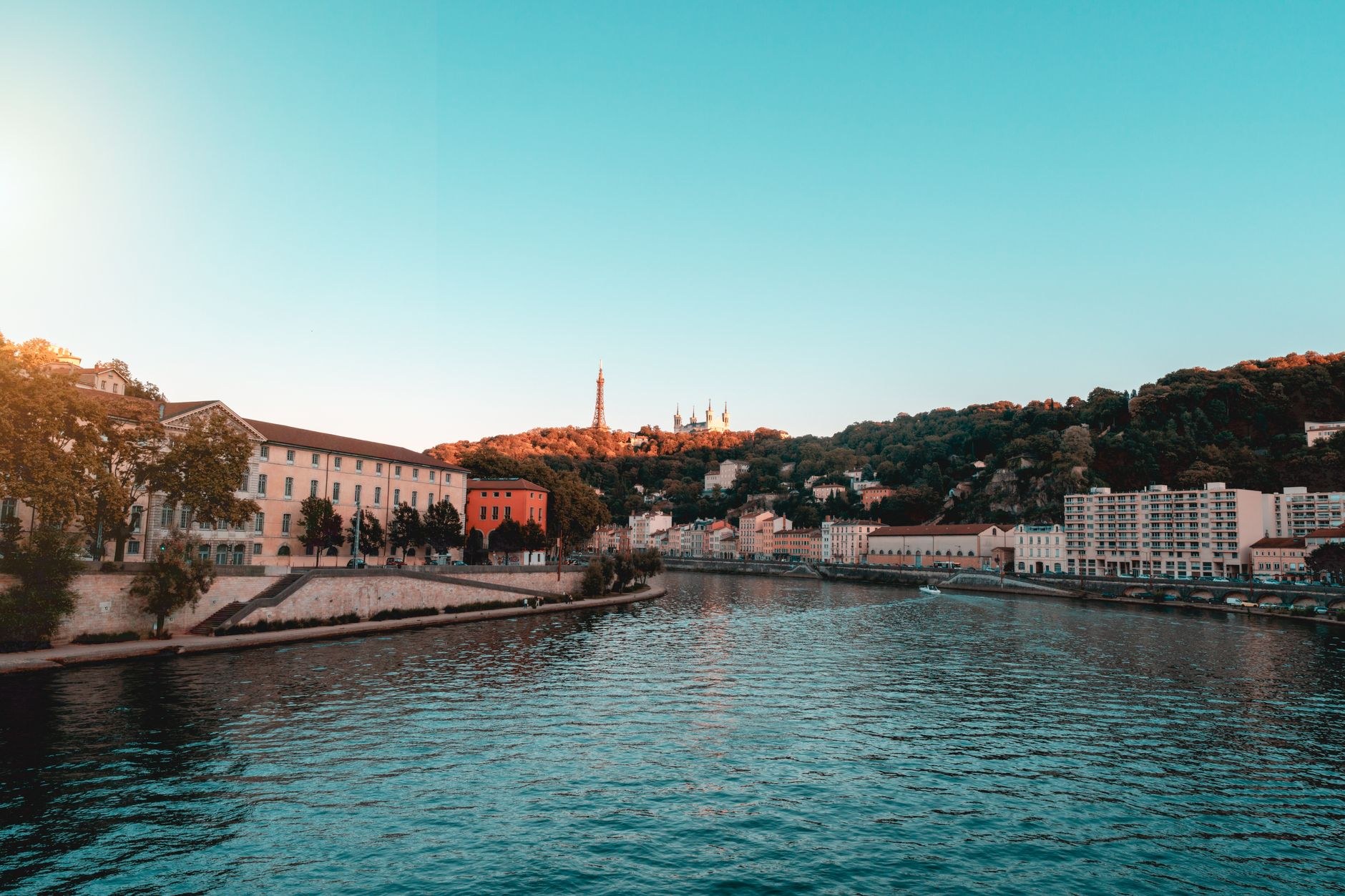 Pastel Renaissance riverfront facades of Vieux Lyon beneath Fourvière basilica
