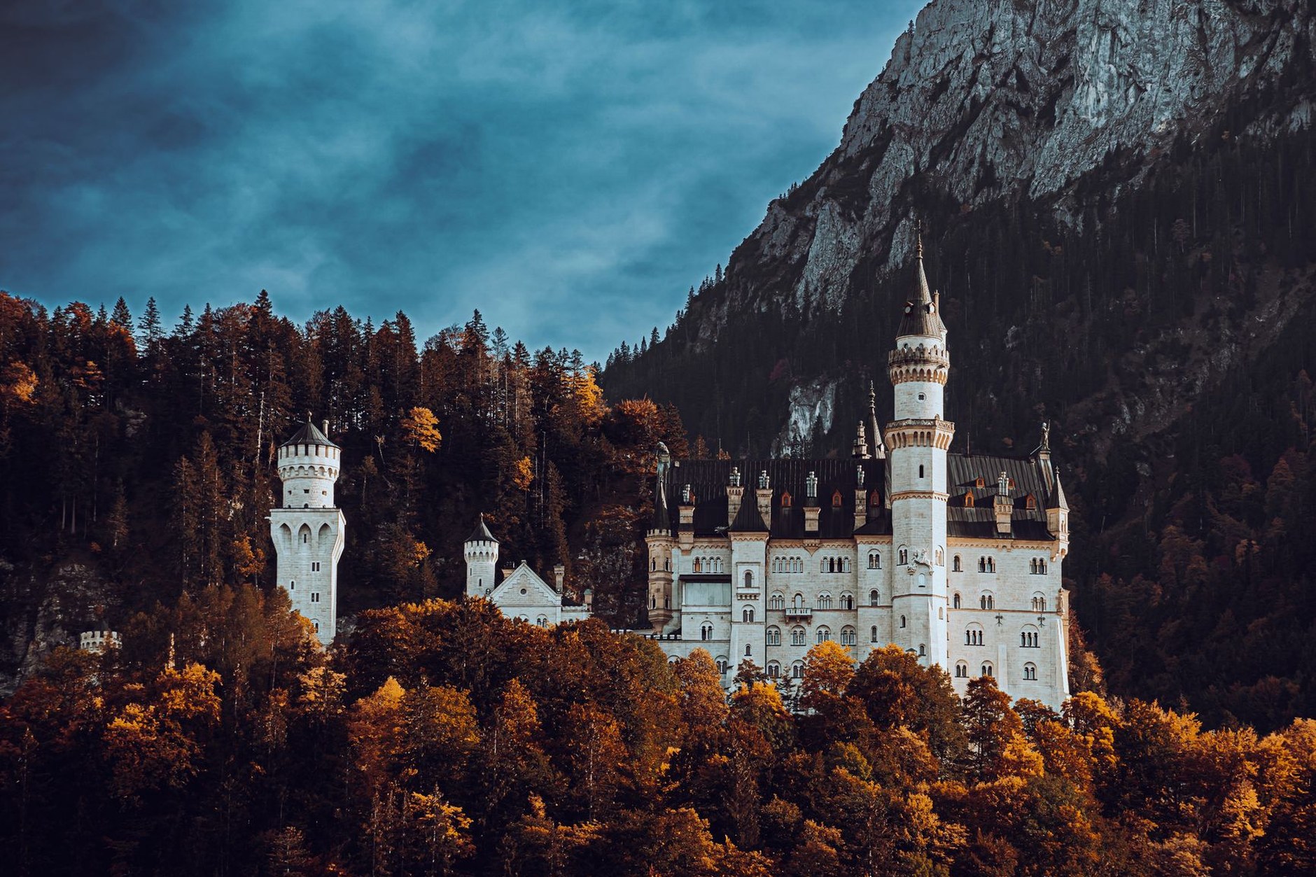 Neuschwanstein Castle perched on a rugged alpine ridge in Bavaria
