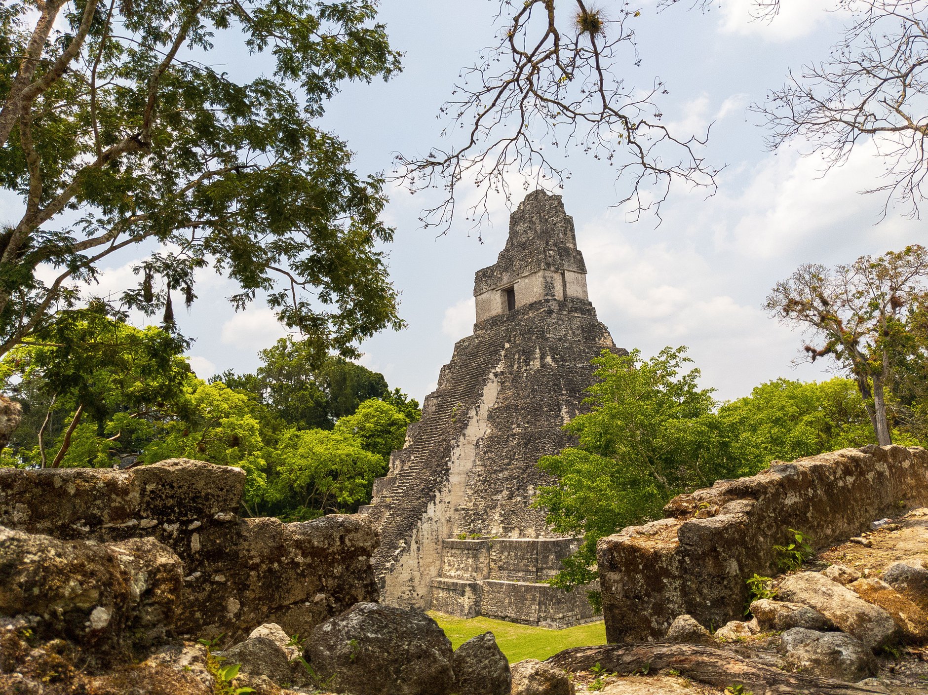 Ancient Maya limestone pyramid Temple I known as the Temple of the Great Jaguar towering over the Great Plaza in Tikal