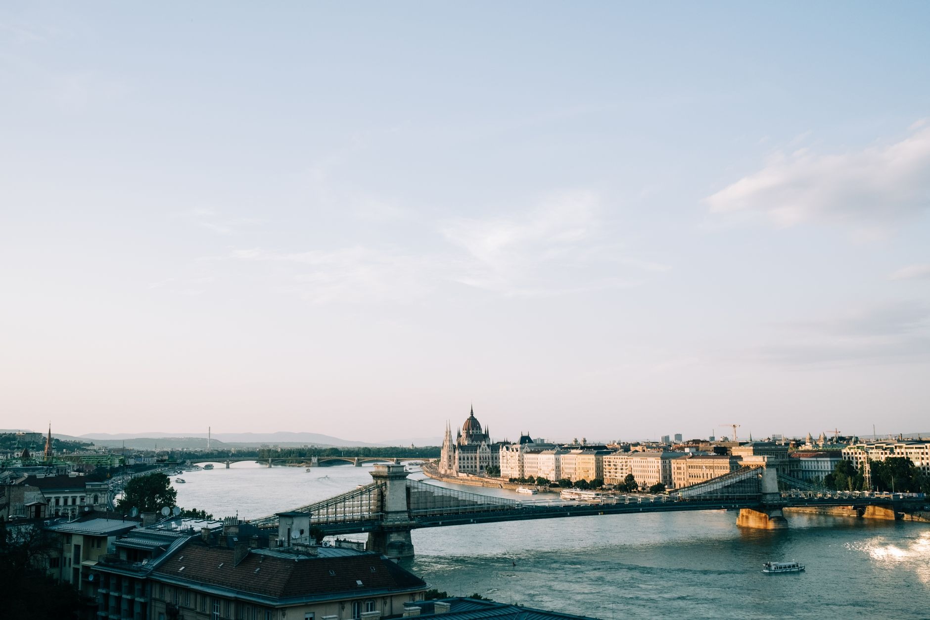 Iconic stone lions and suspension cables of the Széchenyi Chain Bridge crossing the Danube River in Budapest