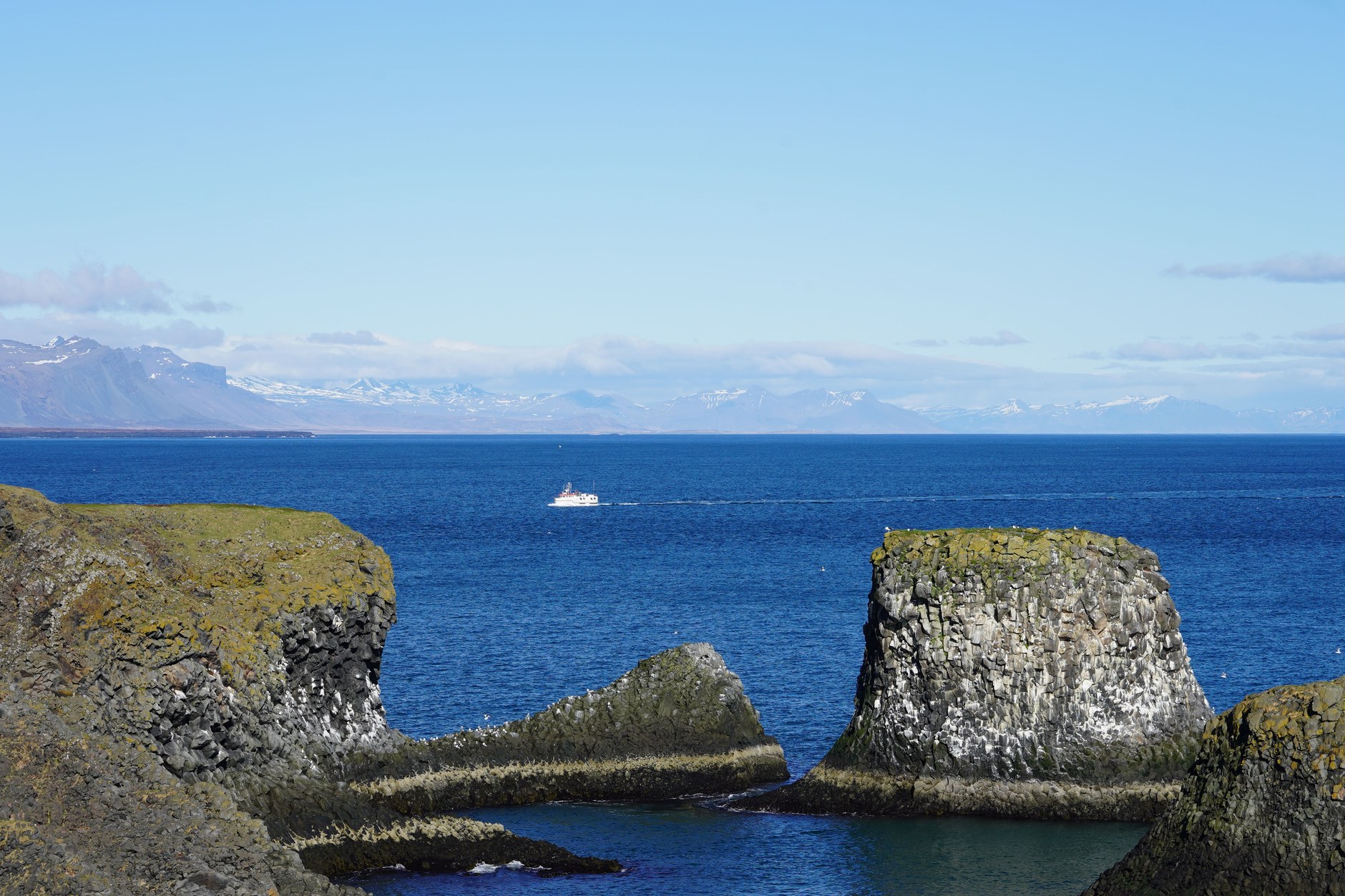Natural volcanic sea arch and basalt cliff path near Arnarstapi on the Snæfellsnes Peninsula
