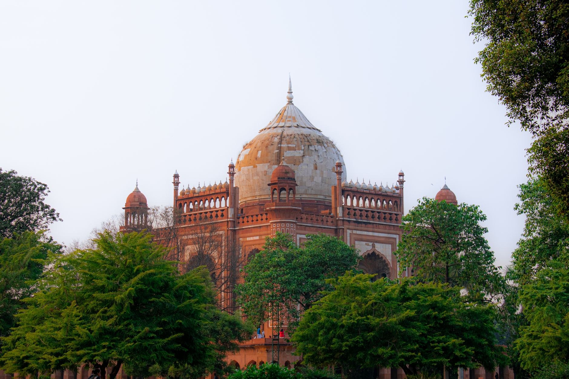 Red sandstone and white marble dome of Humayun's Tomb surrounded by symmetrical Persian gardens