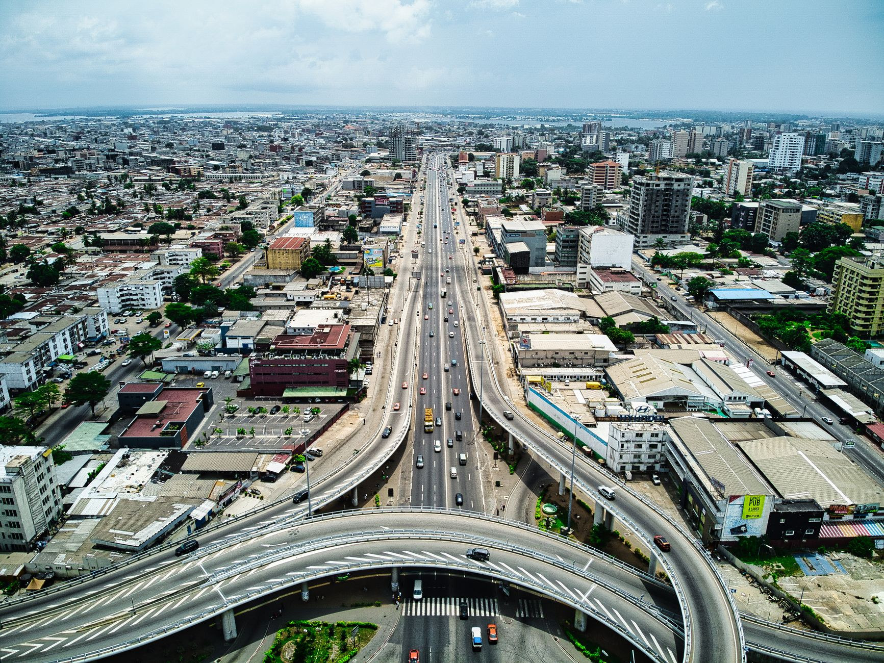 Modern multi-lane urban expressway bridge connecting central districts across Abidjan