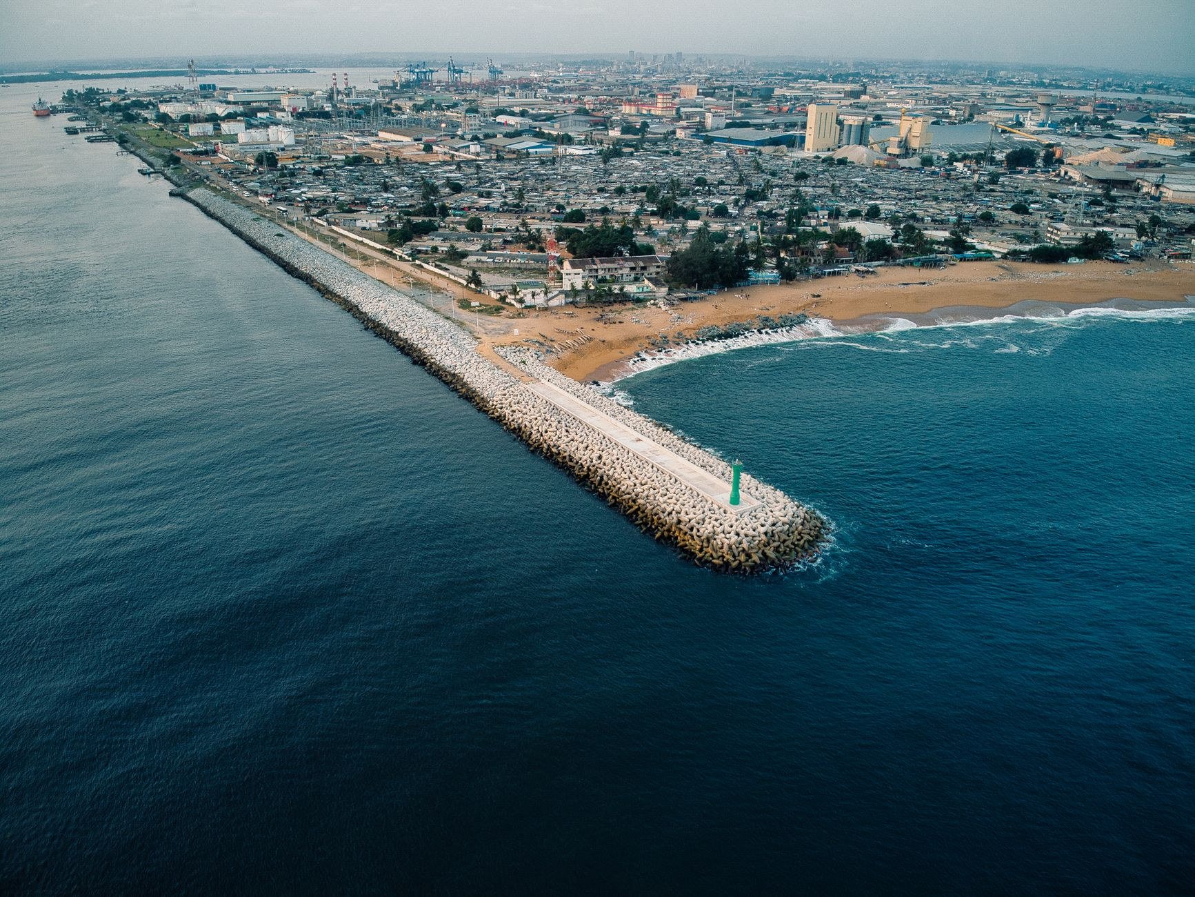 Aerial perspective across the coastal lagoons and urban waterways of Abidjan in Cote d'Ivoire