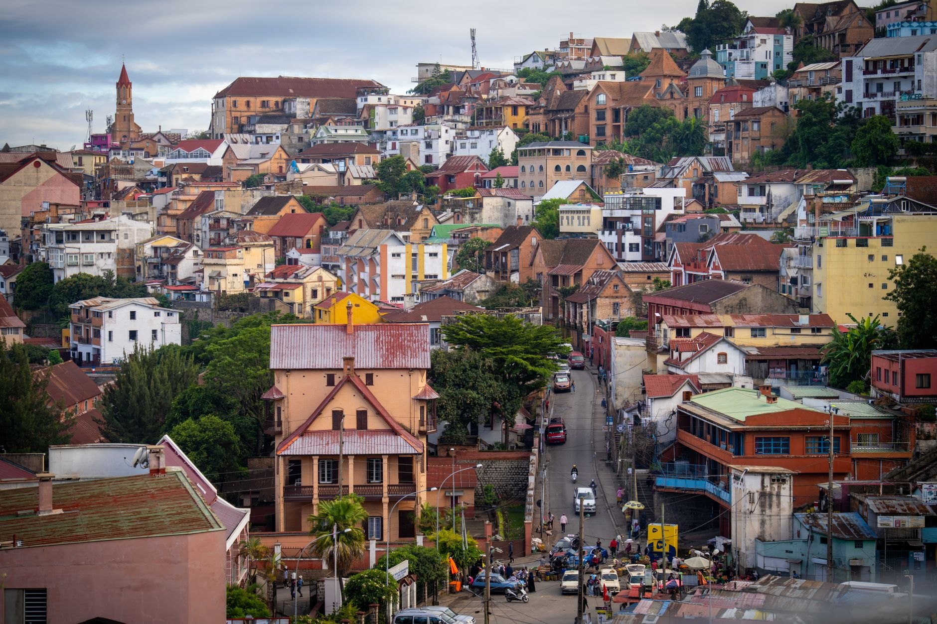 Tiered brick houses and church spires stretching across the steep granite hills of Antananarivo