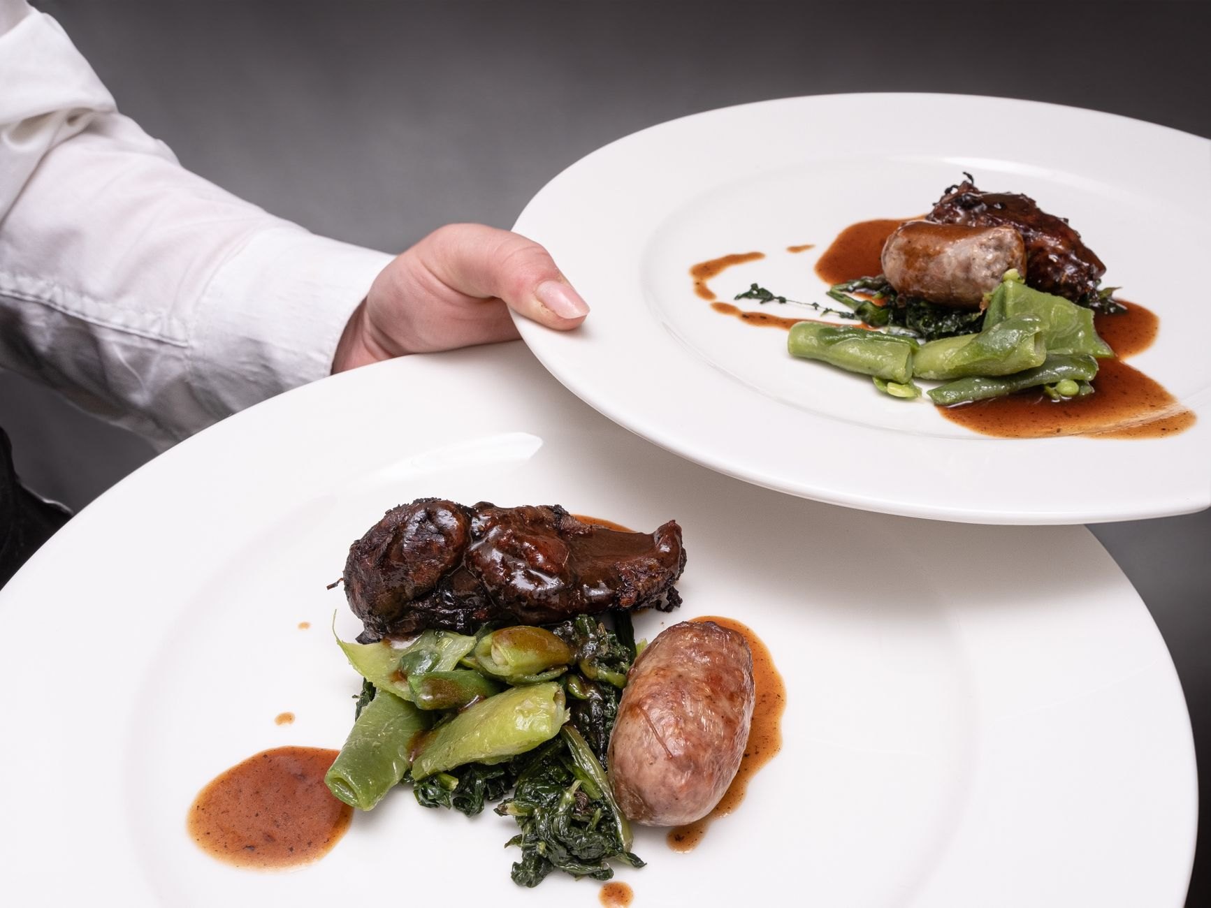 Tender skewers of charcoal-grilled zebu beef served with seasoned local sides and savory dipping sauce