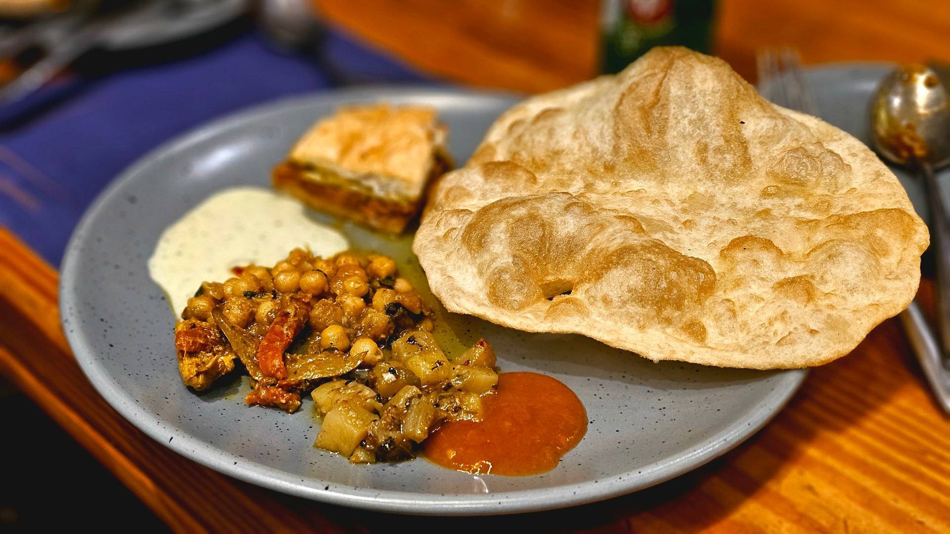 Freshly prepared Maldivian mas huni with flaked tuna, grated coconut, chili, and warm roshi flatbreads
