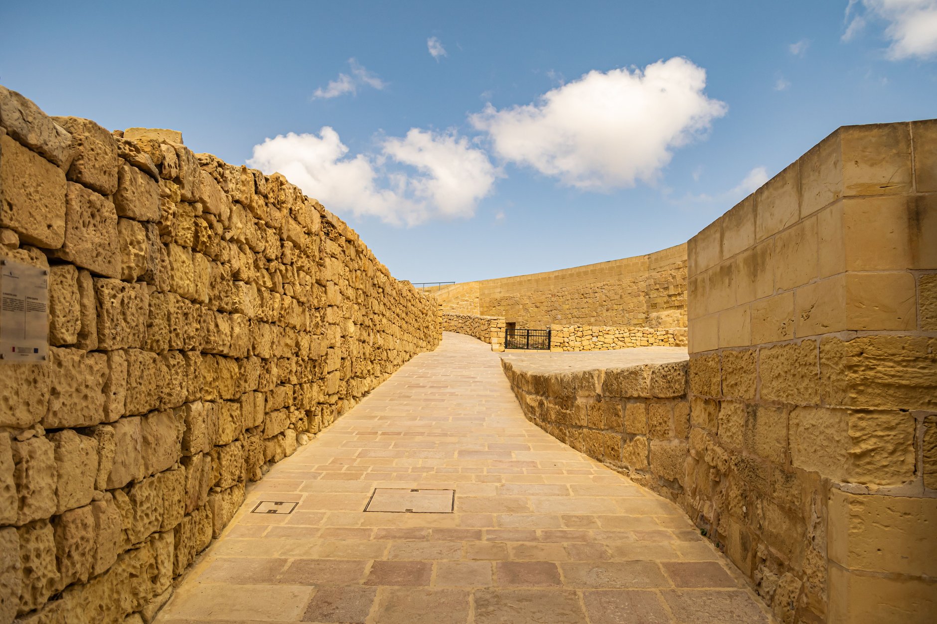 High stone defensive bastions of the medieval Cittadella towering over the town of Victoria in the center of Gozo