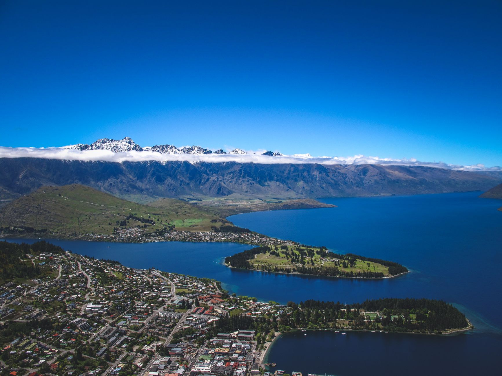 Queenstown nestled against Lake Wakatipu and rugged mountains