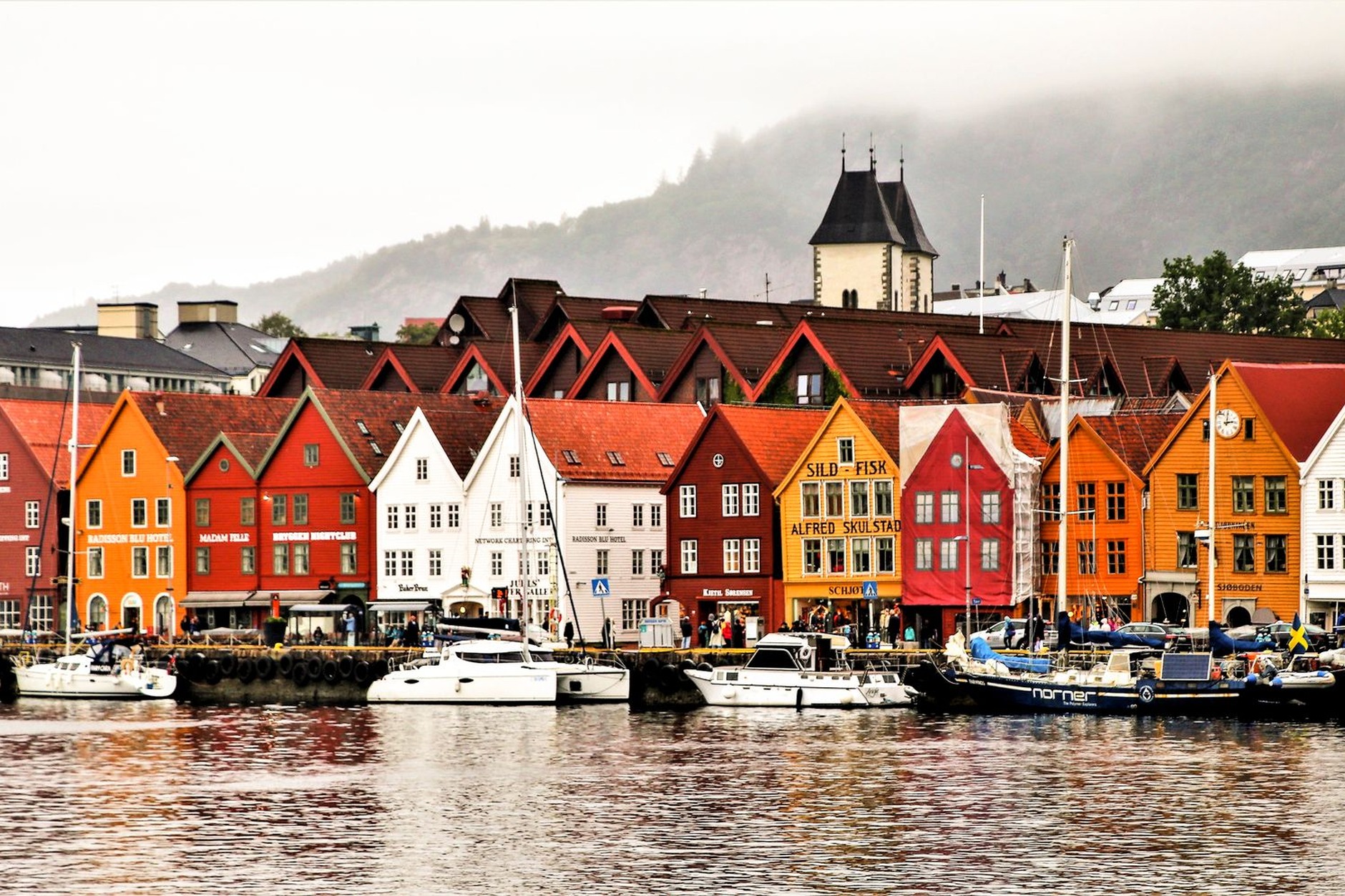 Historic colorful wooden Hanseatic merchant houses along Bryggen wharf in Bergen