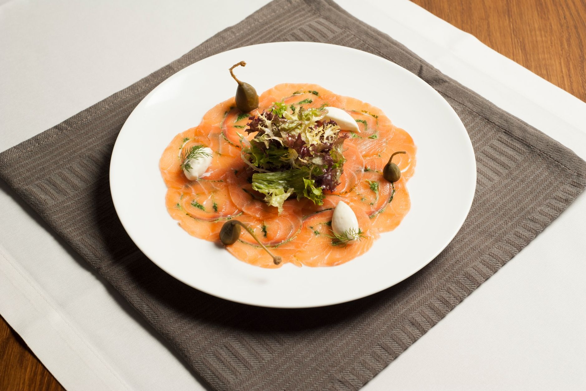 Freshly prepared Norwegian grilled salmon fillet served with summer vegetables