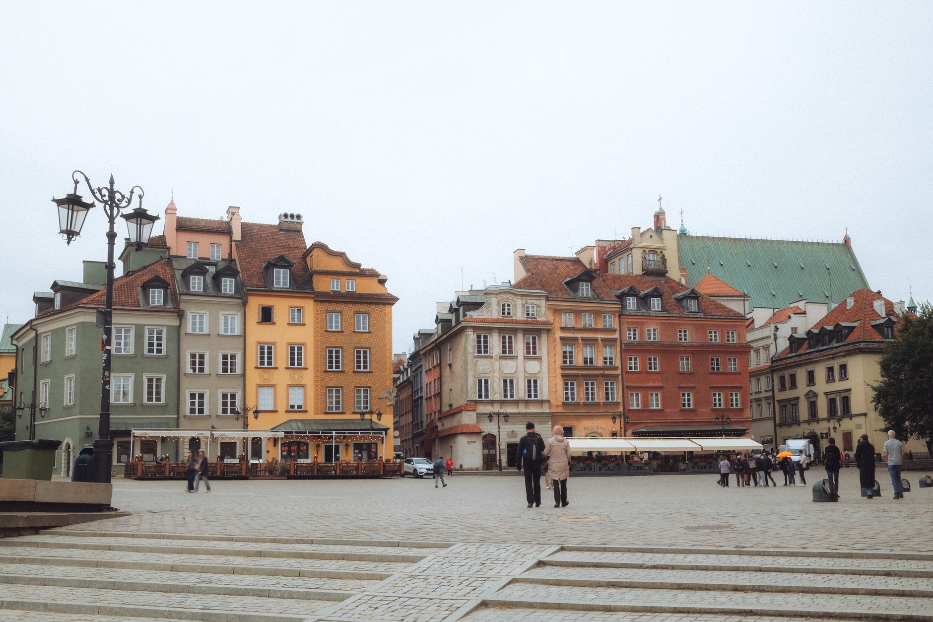 Meticulously restored colorful merchant houses and cobblestones in Warsaw's UNESCO-listed Old Town Market Square