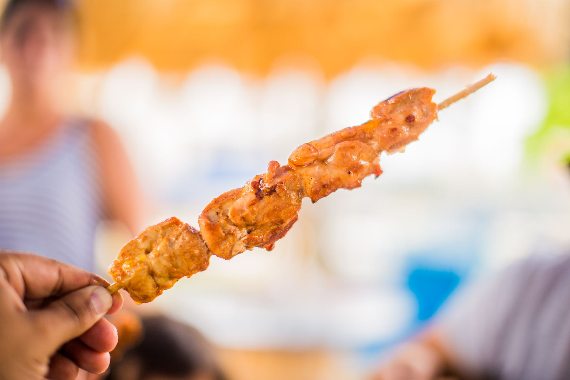 Seasoned Caribbean meat roasted over open wood fire, showcasing Puerto Rican criollo culinary tradition