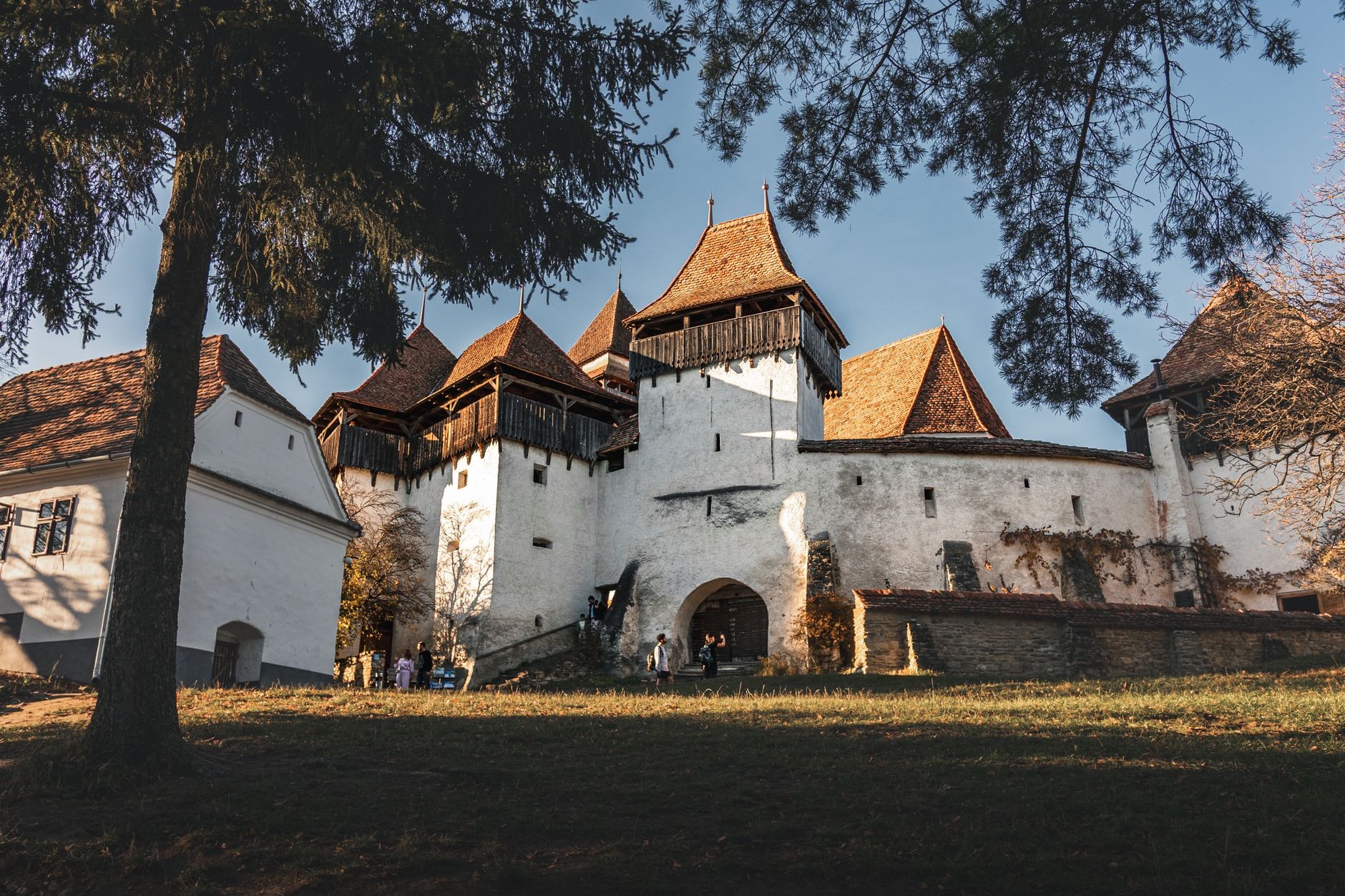 Imposing defensive walls and medieval bastions of the UNESCO Biertan fortified church overlooking the Transylvanian countryside