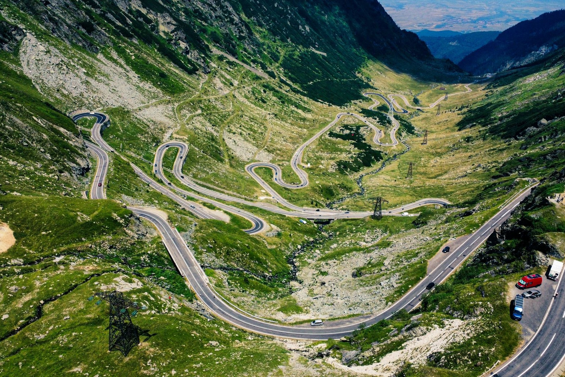 Serpentine mountain curves and dramatic hairpins of the Transfagarasan highway winding through the rugged Fagaras peaks