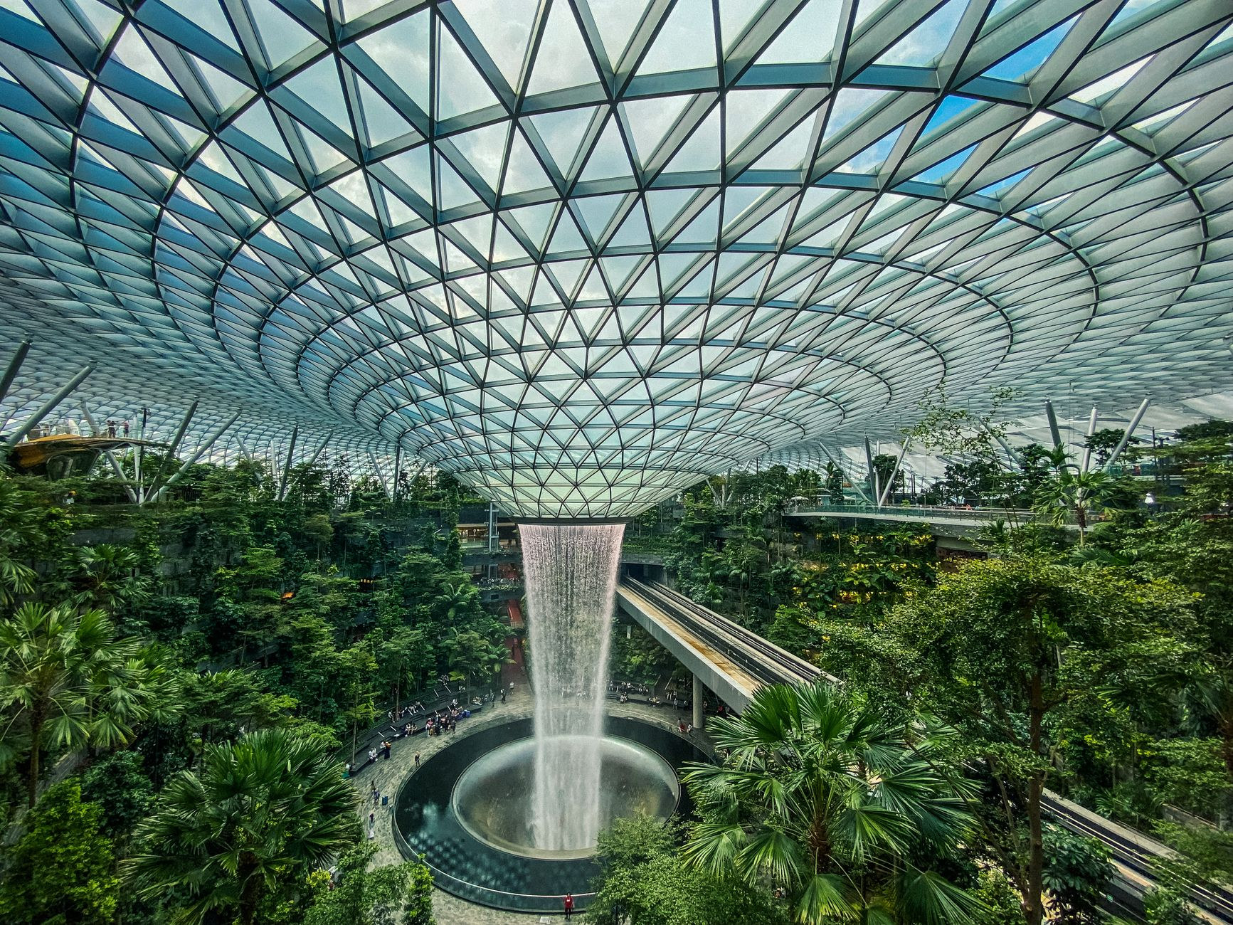 Towering indoor Rain Vortex waterfall at Jewel Changi Airport