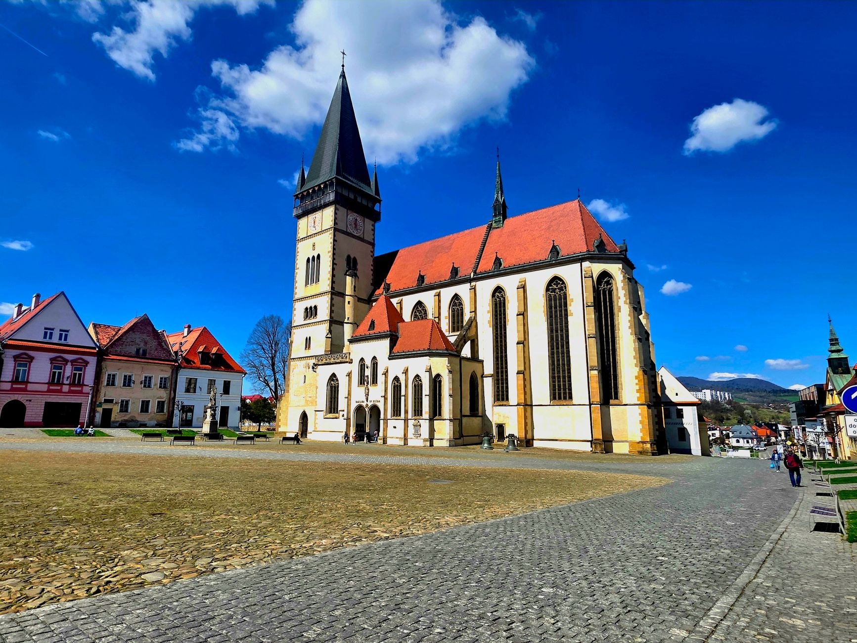 Gothic town hall with arcades and St. James Basilica in the historic Renaissance square of Levoča