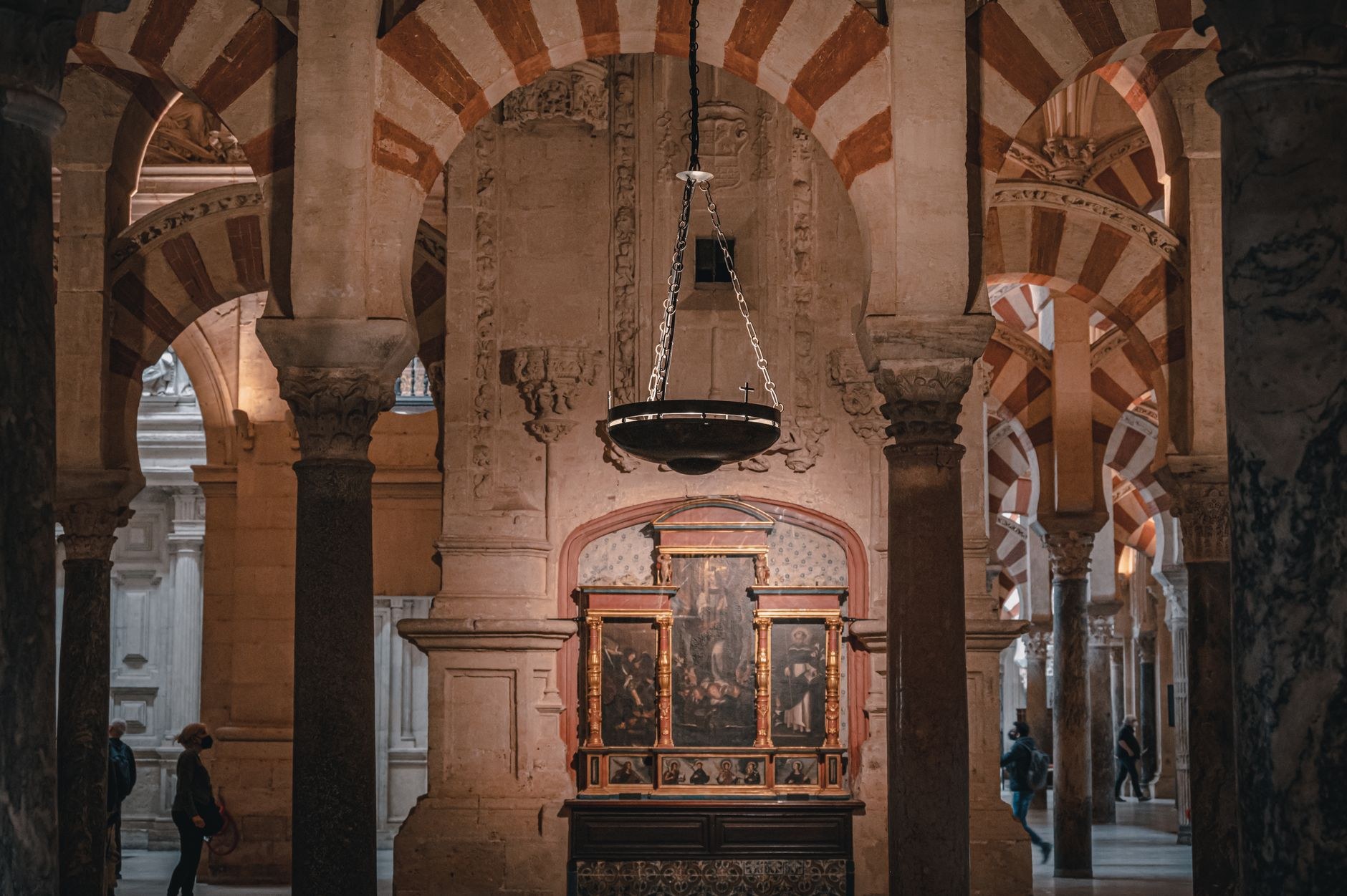Hypostyle hall of red-and-white horseshoe arches inside the Mezquita of Córdoba