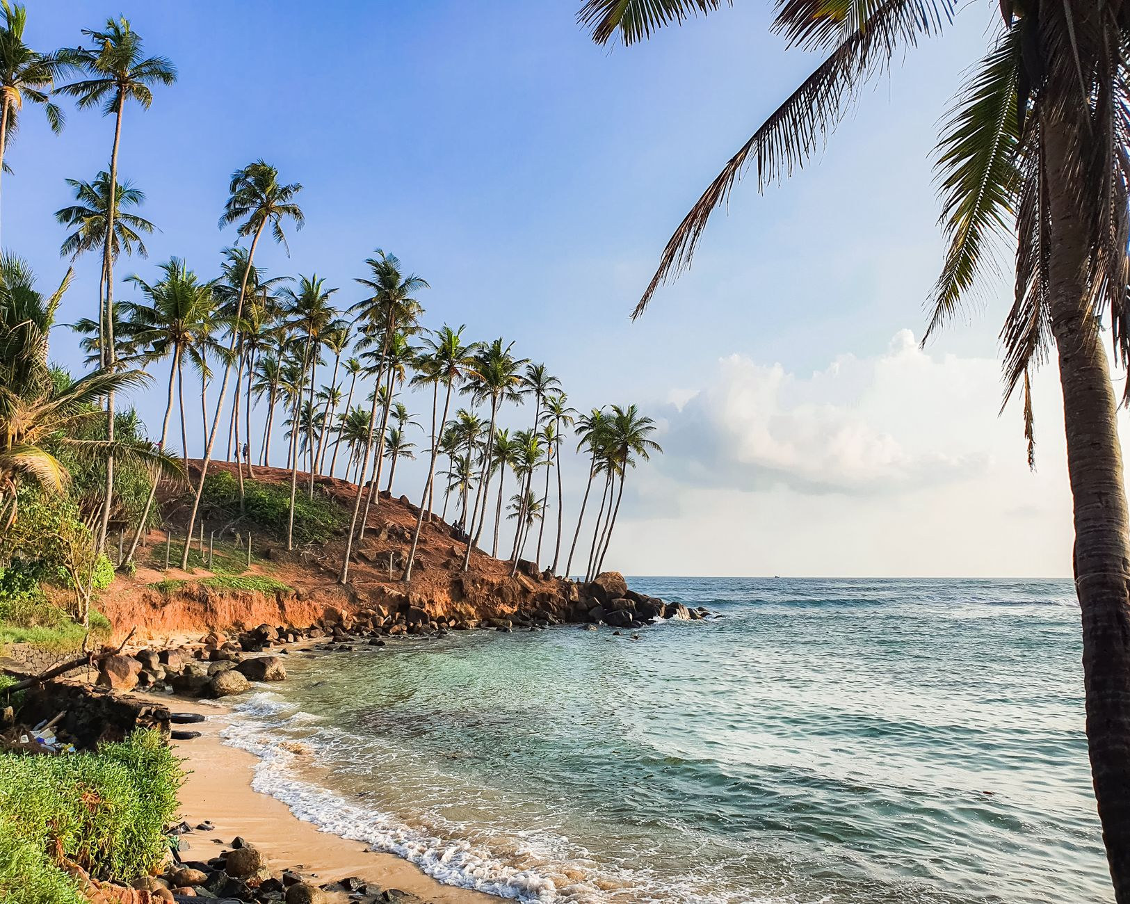 Palm-fringed golden sand beach along Sri Lanka's south coast
